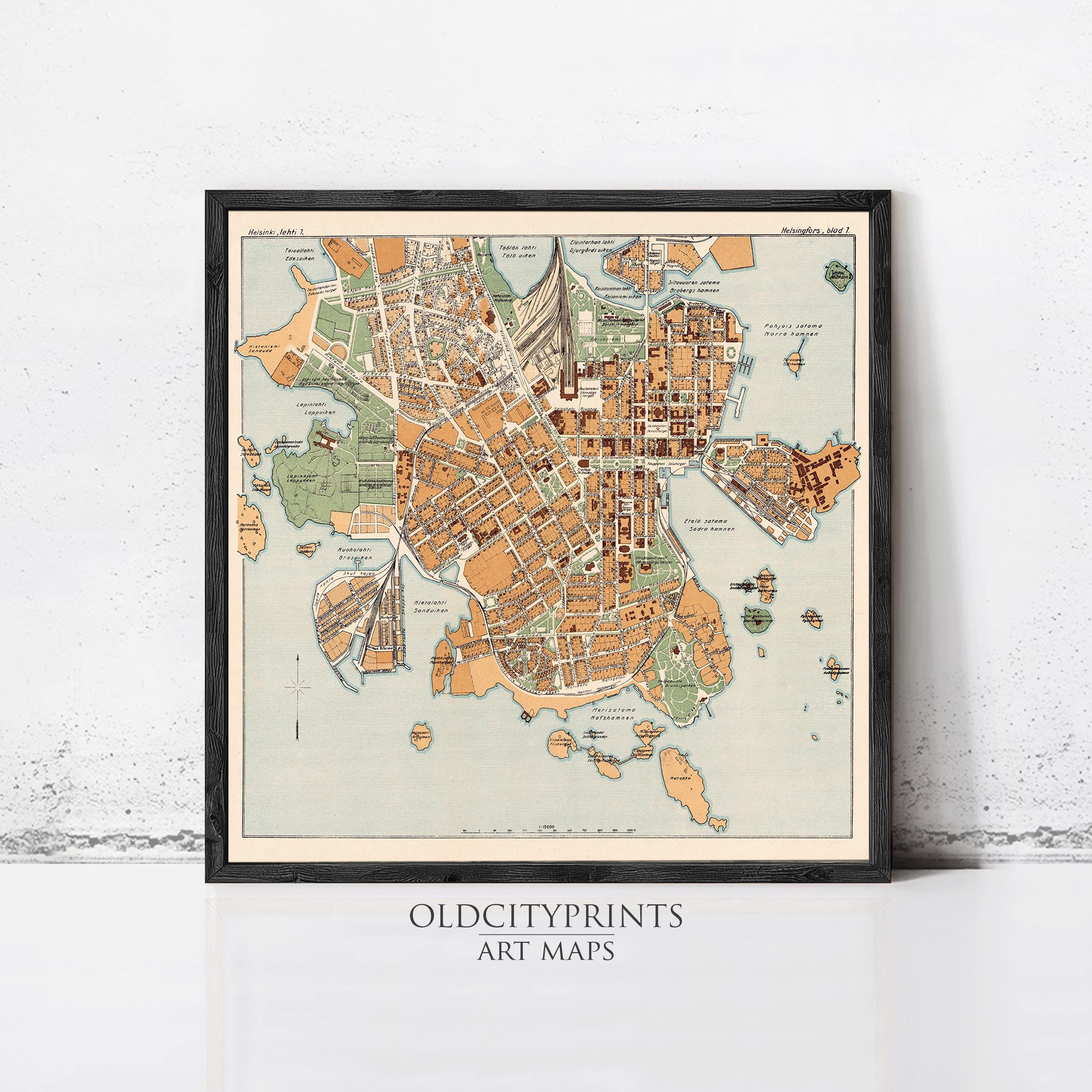 The image is a framed vintage map of an old city, likely from the 19th century, with a detailed and colorful depiction of the city's layout and surrounding areas.
