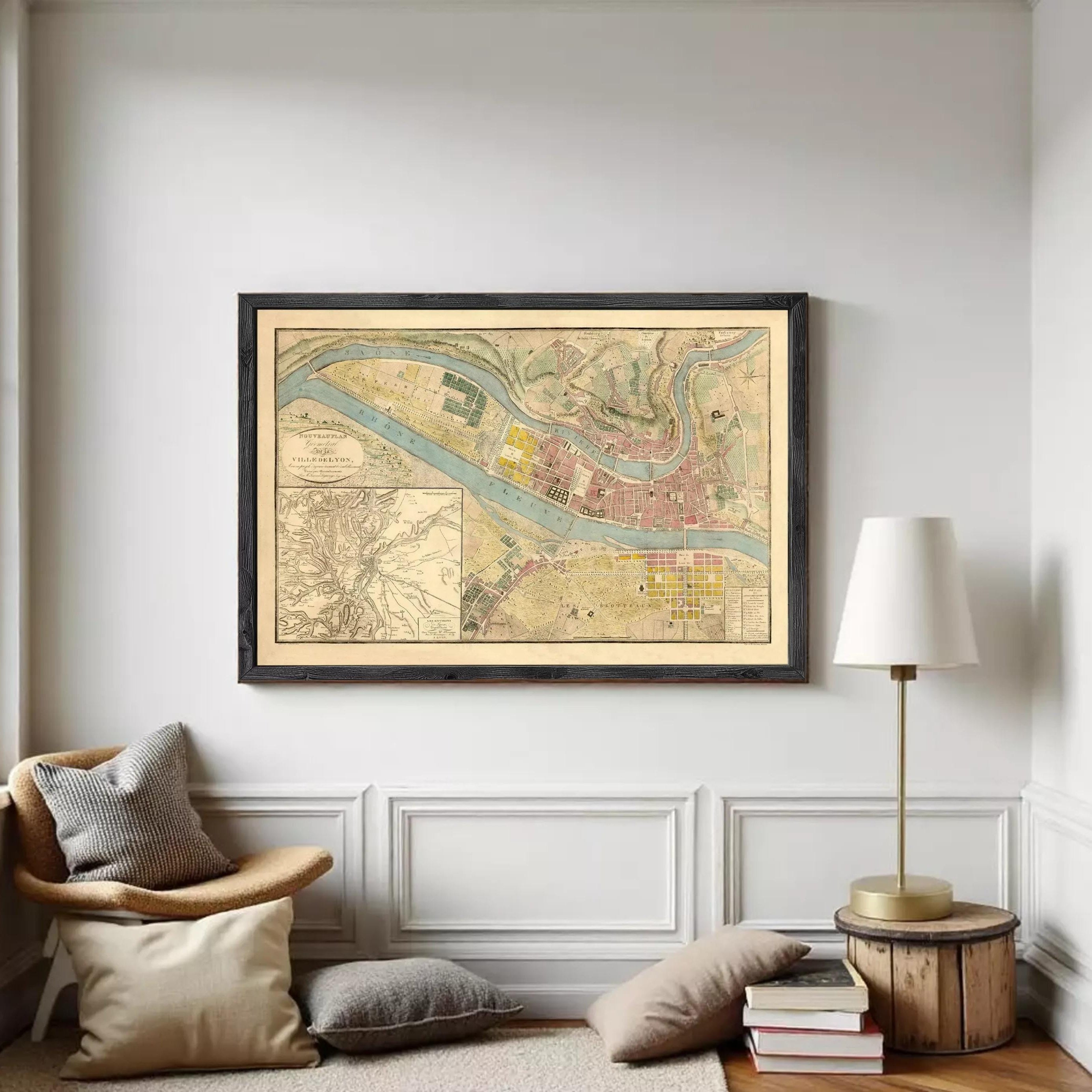 The image is a framed vintage map of a city, depicting a detailed layout of streets, buildings, and other urban features.