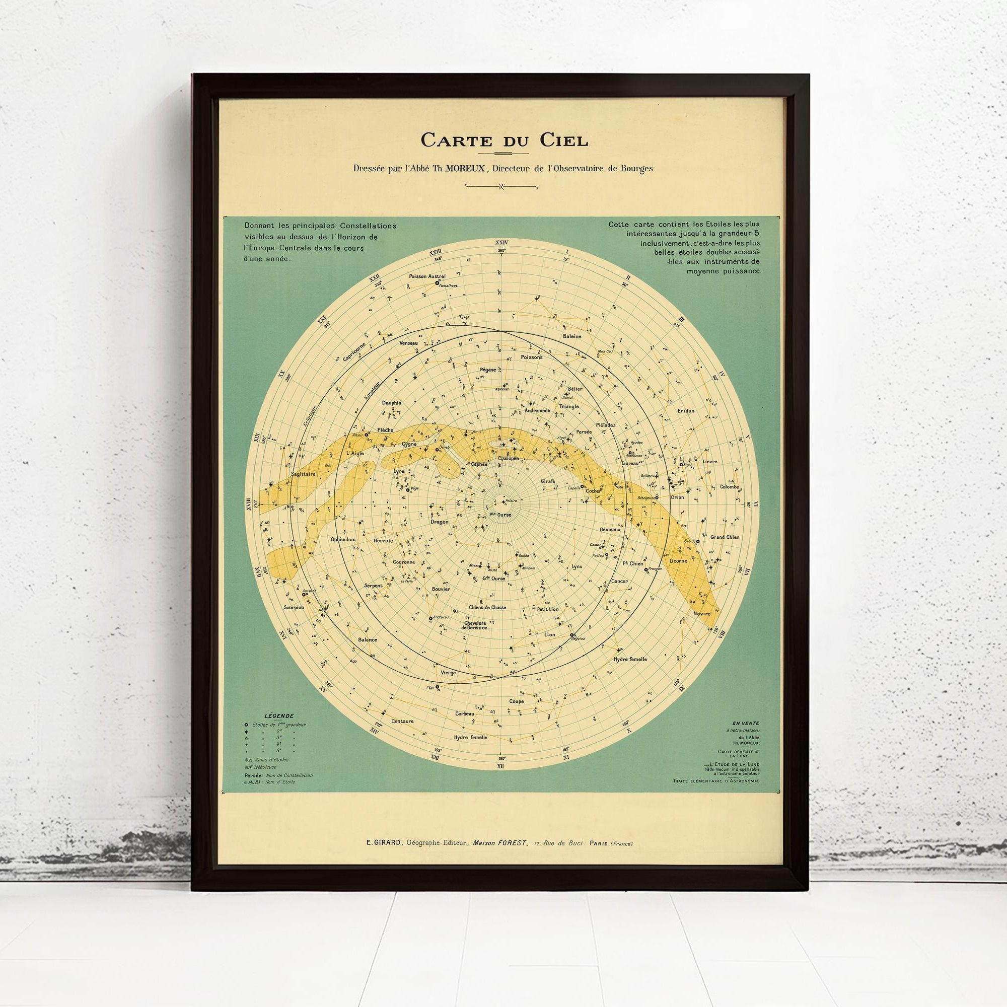 The image is a framed vintage star map of the night sky, depicting various celestial objects and their relative positions.