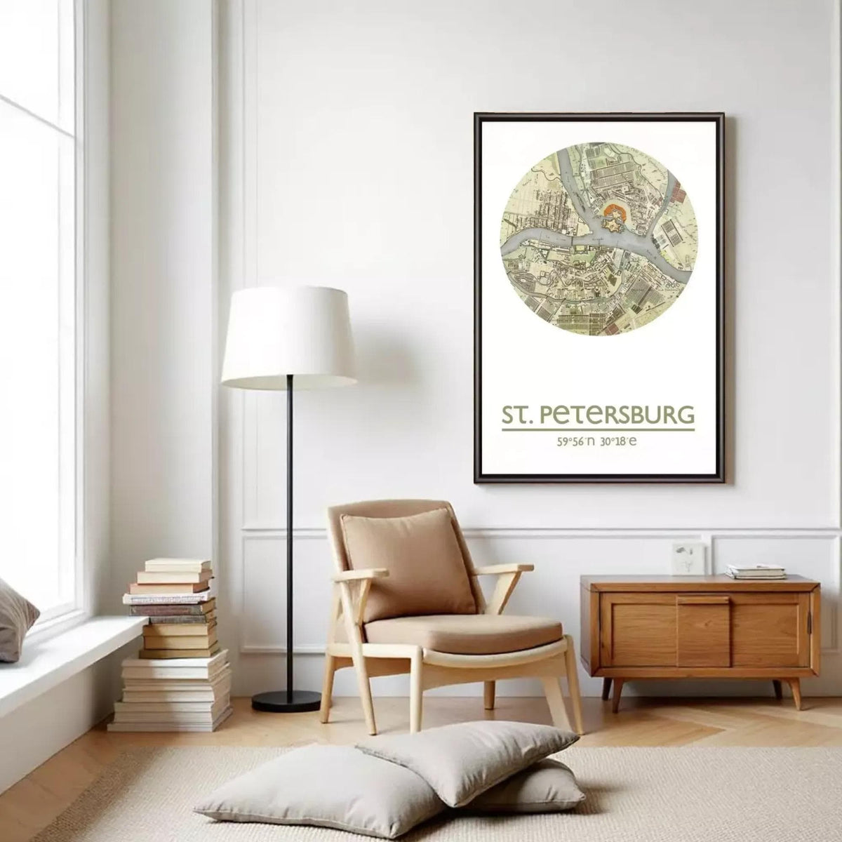a living room with a large map of St. Petersburg hanging on the wall, a wooden side table, a beige armchair, and a stack of books.