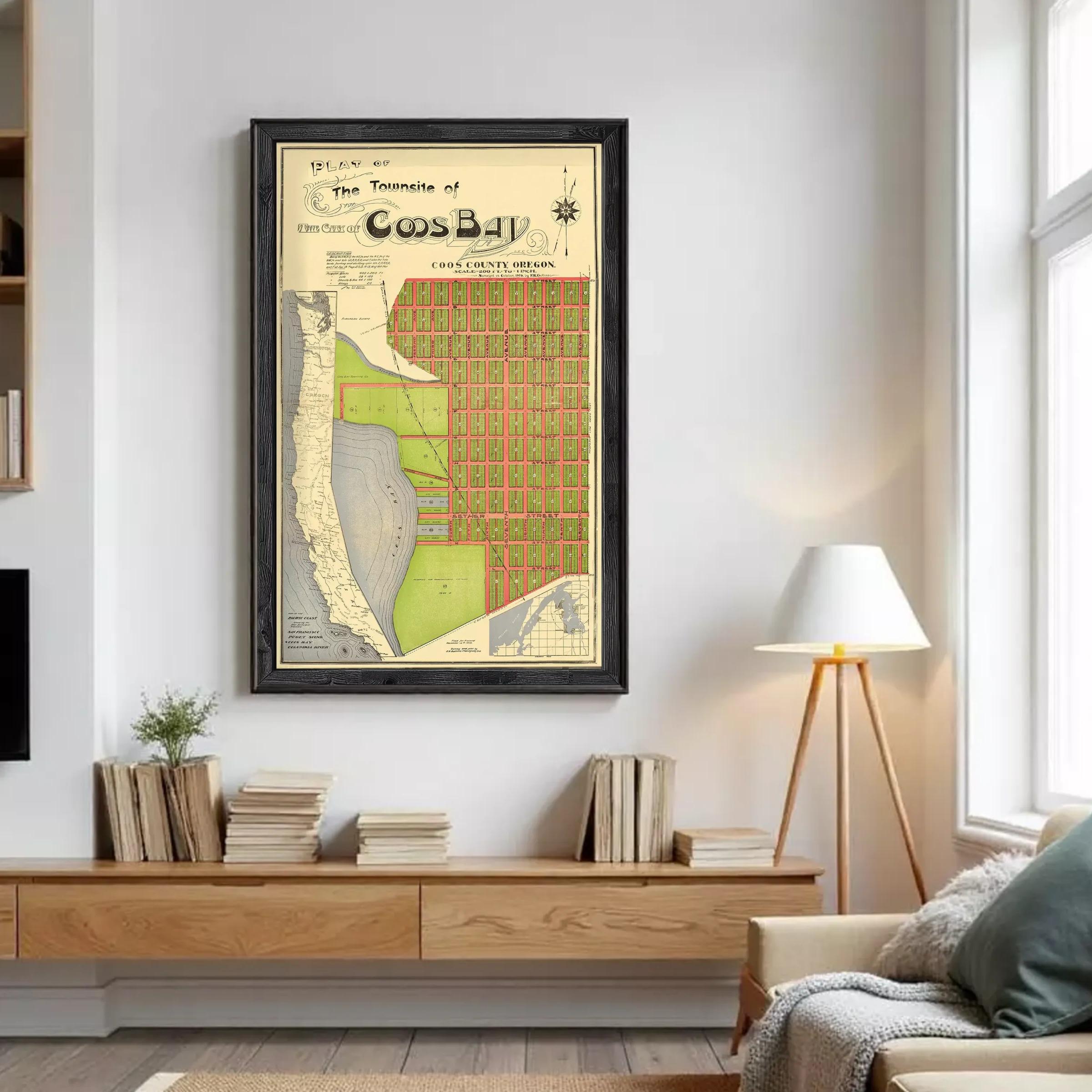 The image is a framed vintage map of the Town of Cos Bay, Oregon, depicting a detailed layout of the area.
