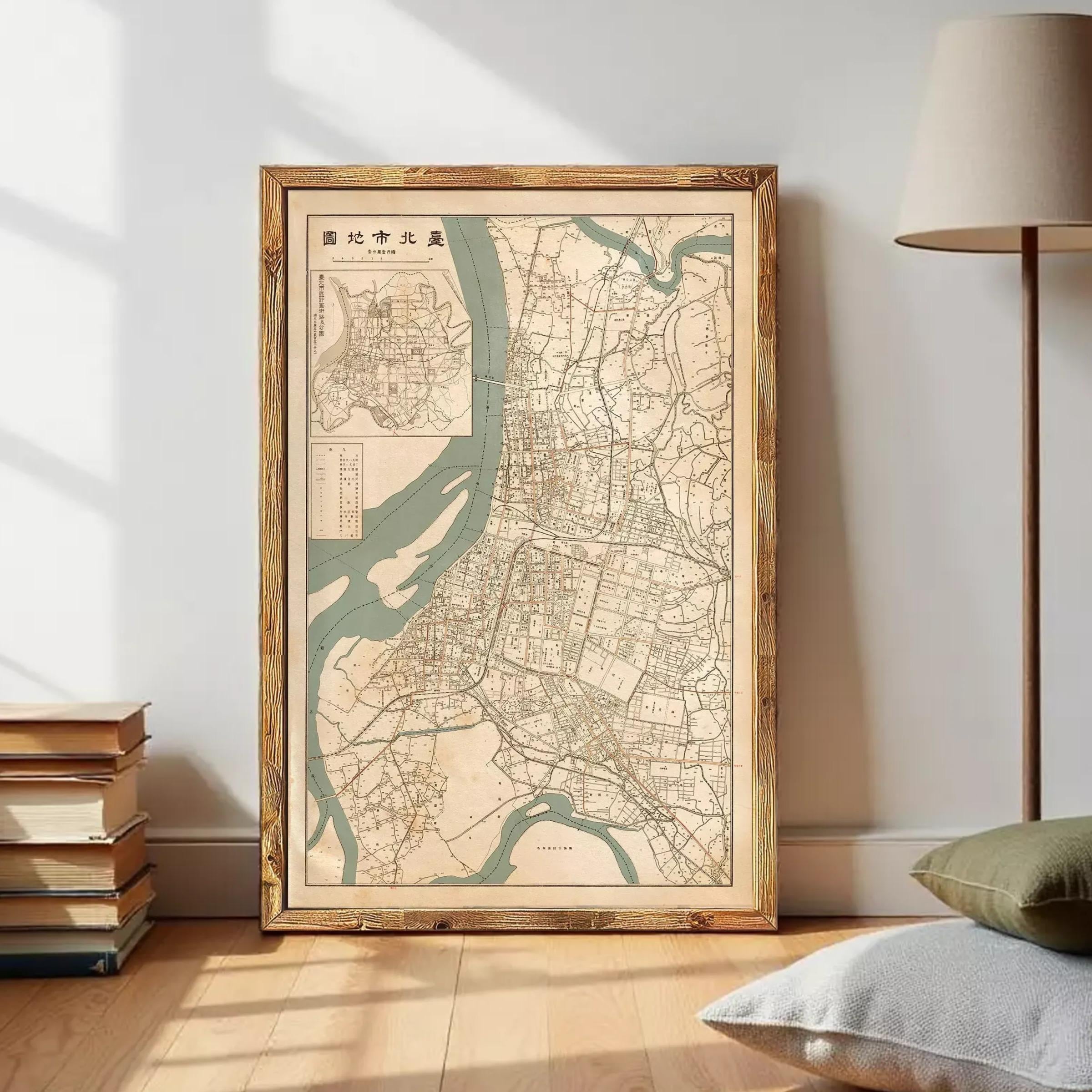 The image is a framed map of a city, likely from an Asian country, displayed on a wall.