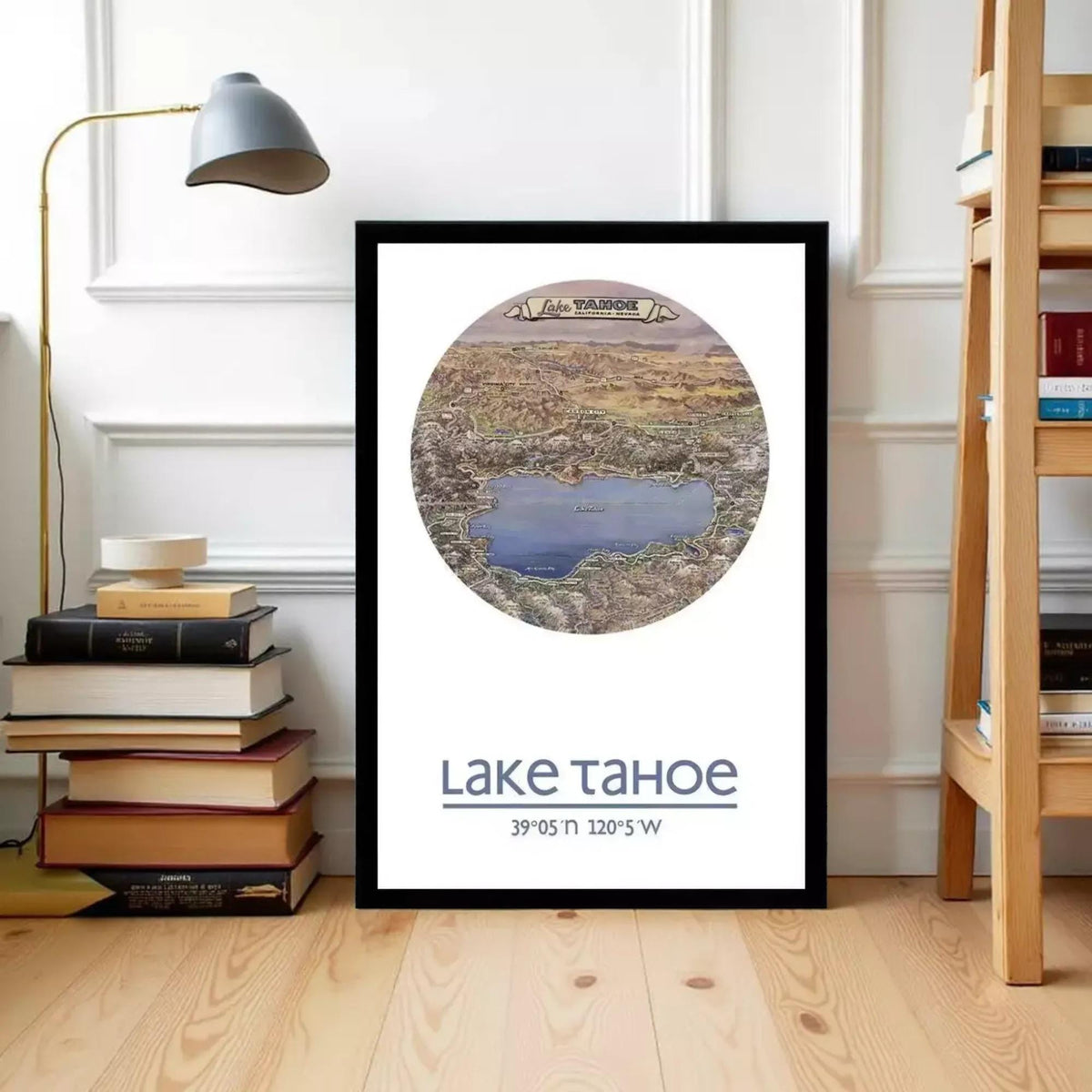 A framed poster of Lake Tahoe is displayed on a wall, with a lamp and bookshelf visible in the background.