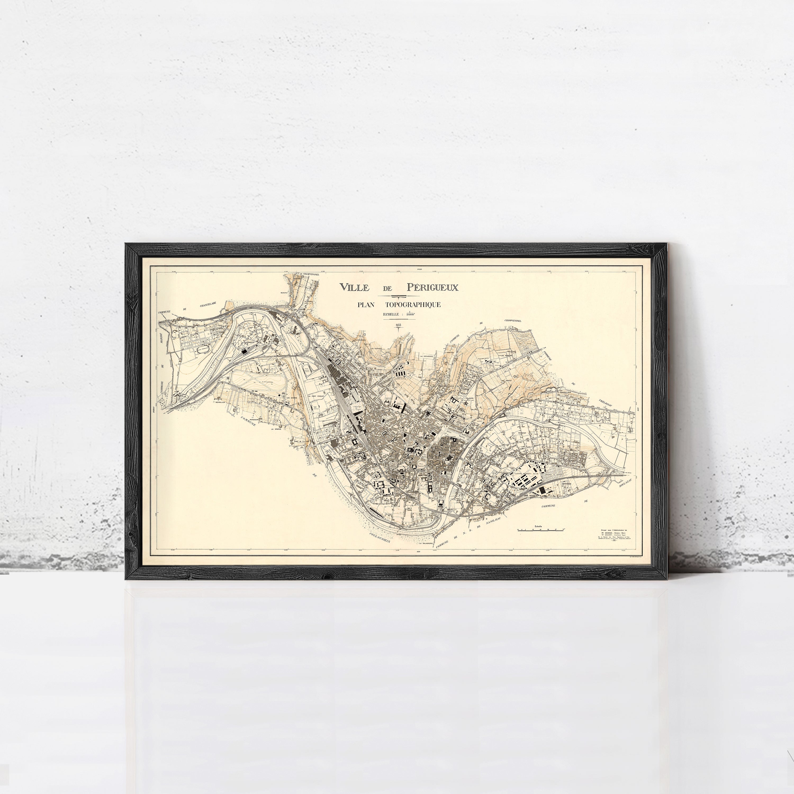 The image is a framed vintage map of Paris, France, depicting the city's layout and surrounding areas.