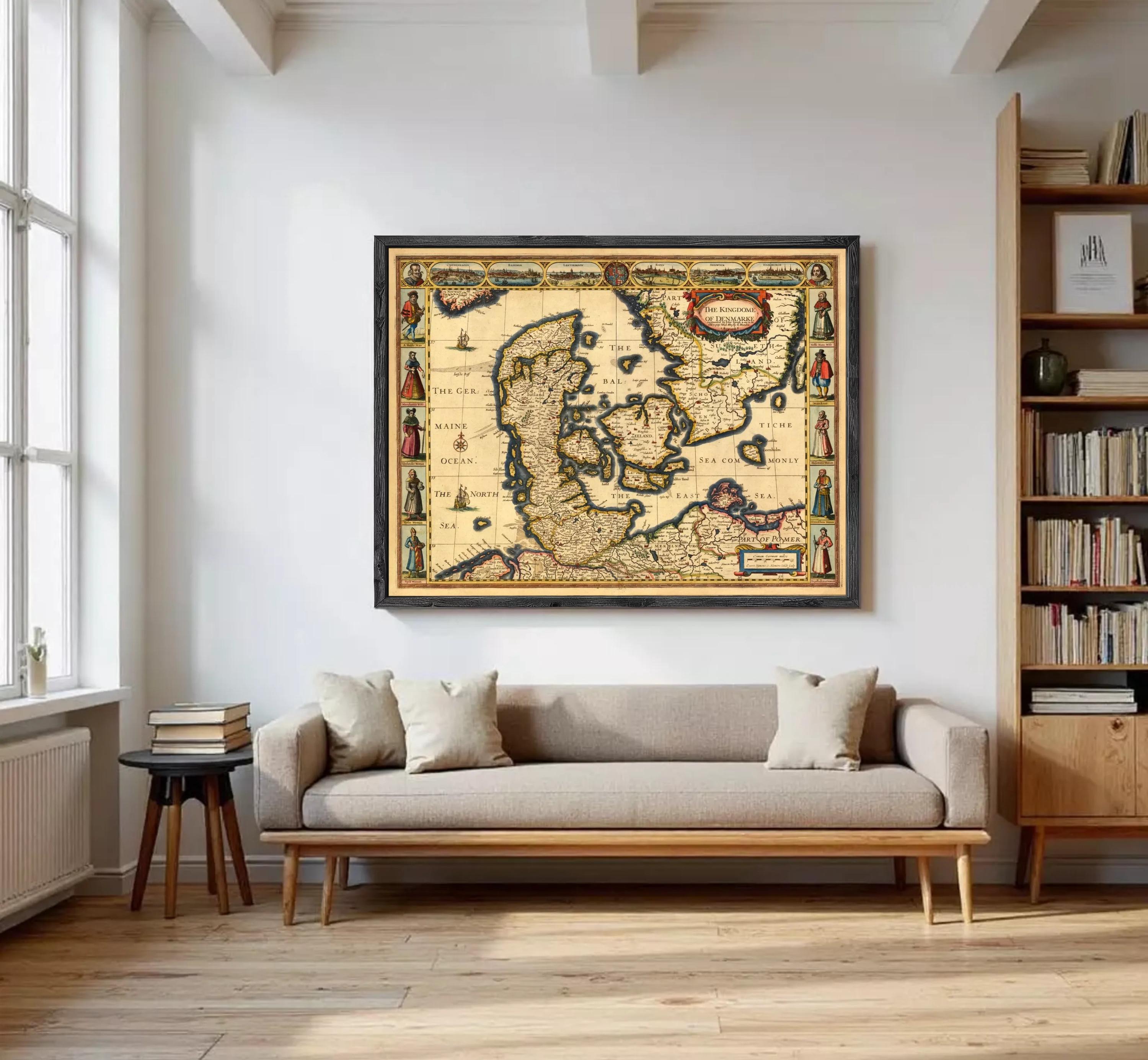 The image is a framed antique map of Europe, featuring detailed illustrations and labels.