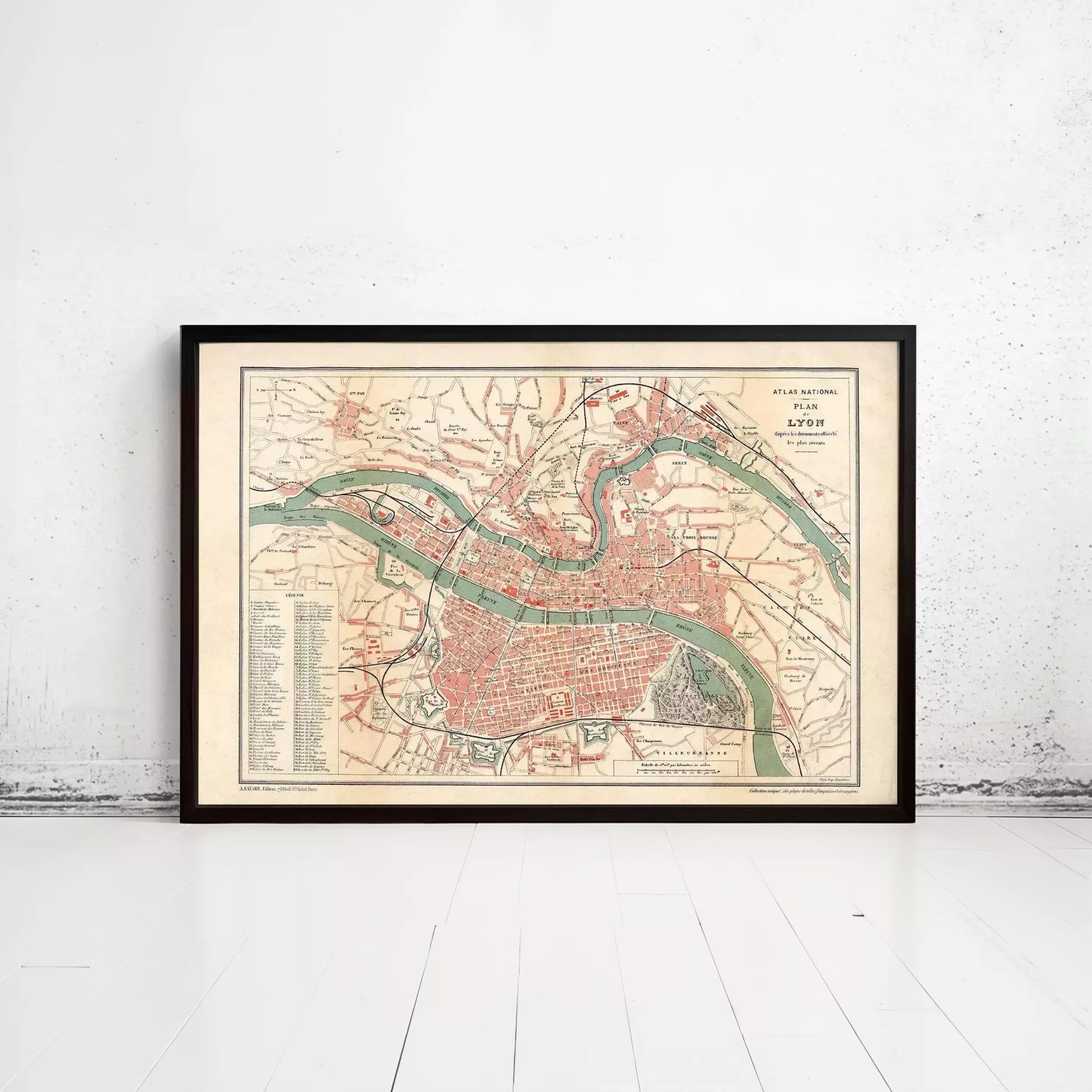 The image is a framed historical map of a city, likely London, with various streets and landmarks depicted.