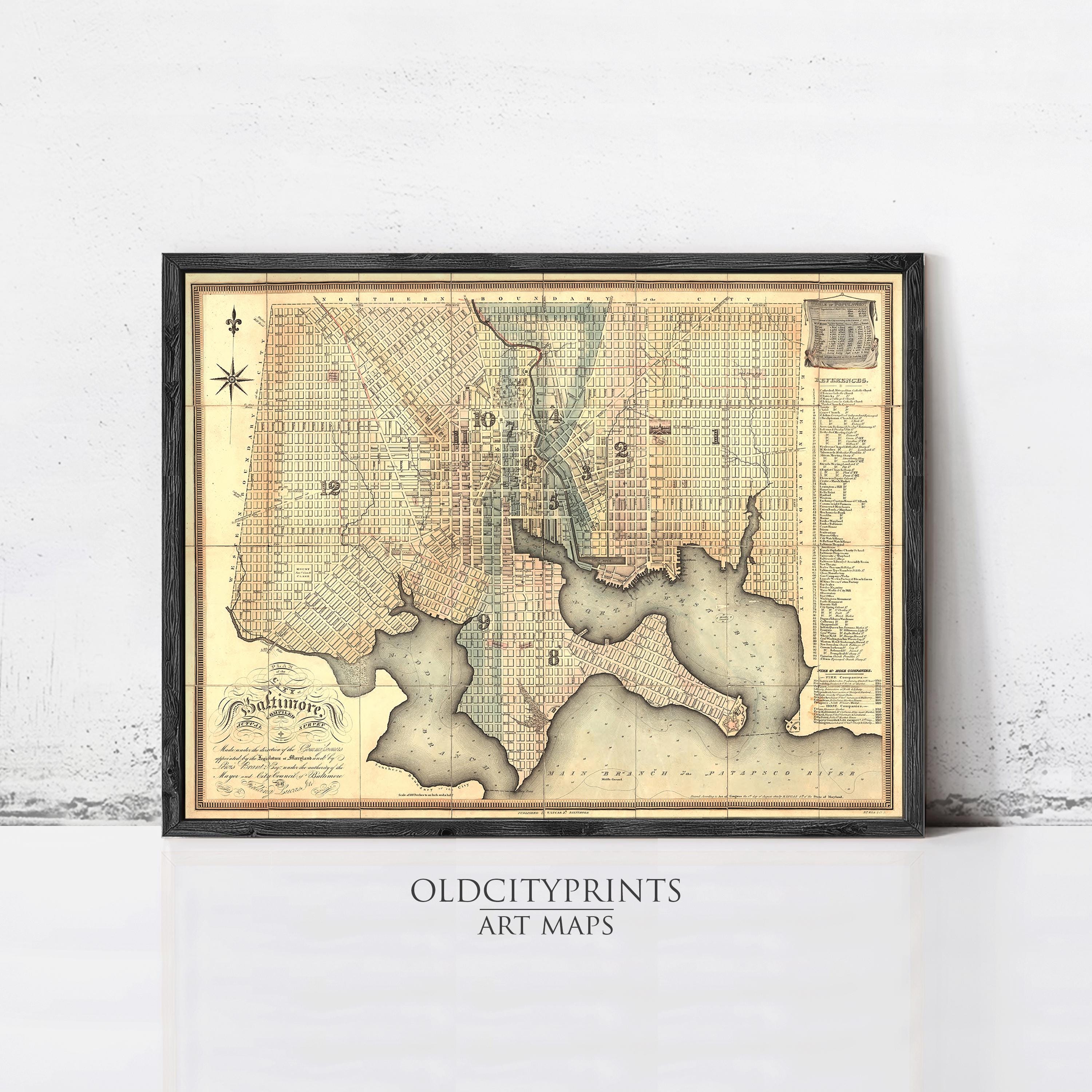 The image is a framed vintage map of a city, likely from the United States, with detailed cartography and labels.