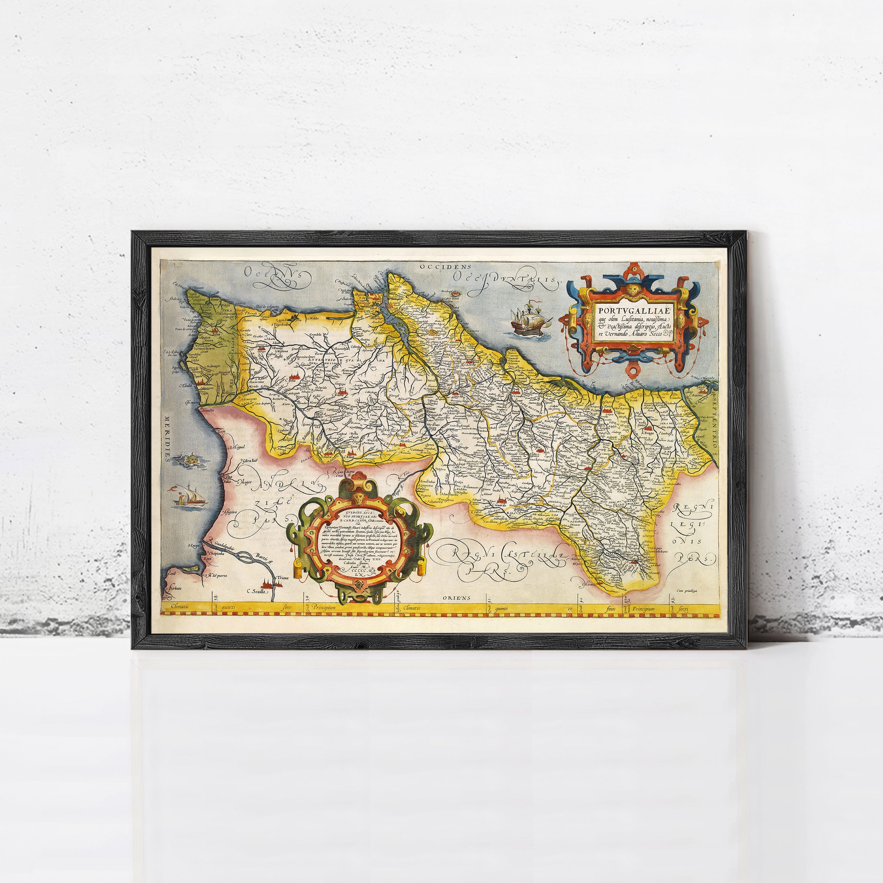 The image is a framed vintage map of a region, likely from the 16th century, with intricate details and decorative elements.