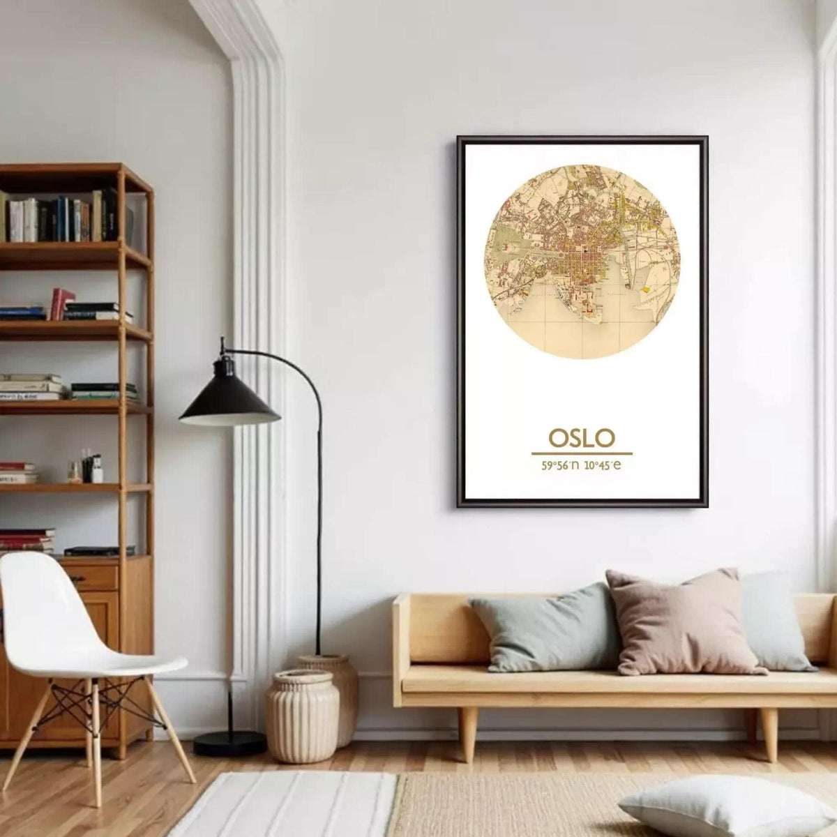 a living room with a large framed map of Oslo, Norway, hanging on the wall. The room has a wooden floor, a white sofa, a wooden bookshelf, and a floor lamp.