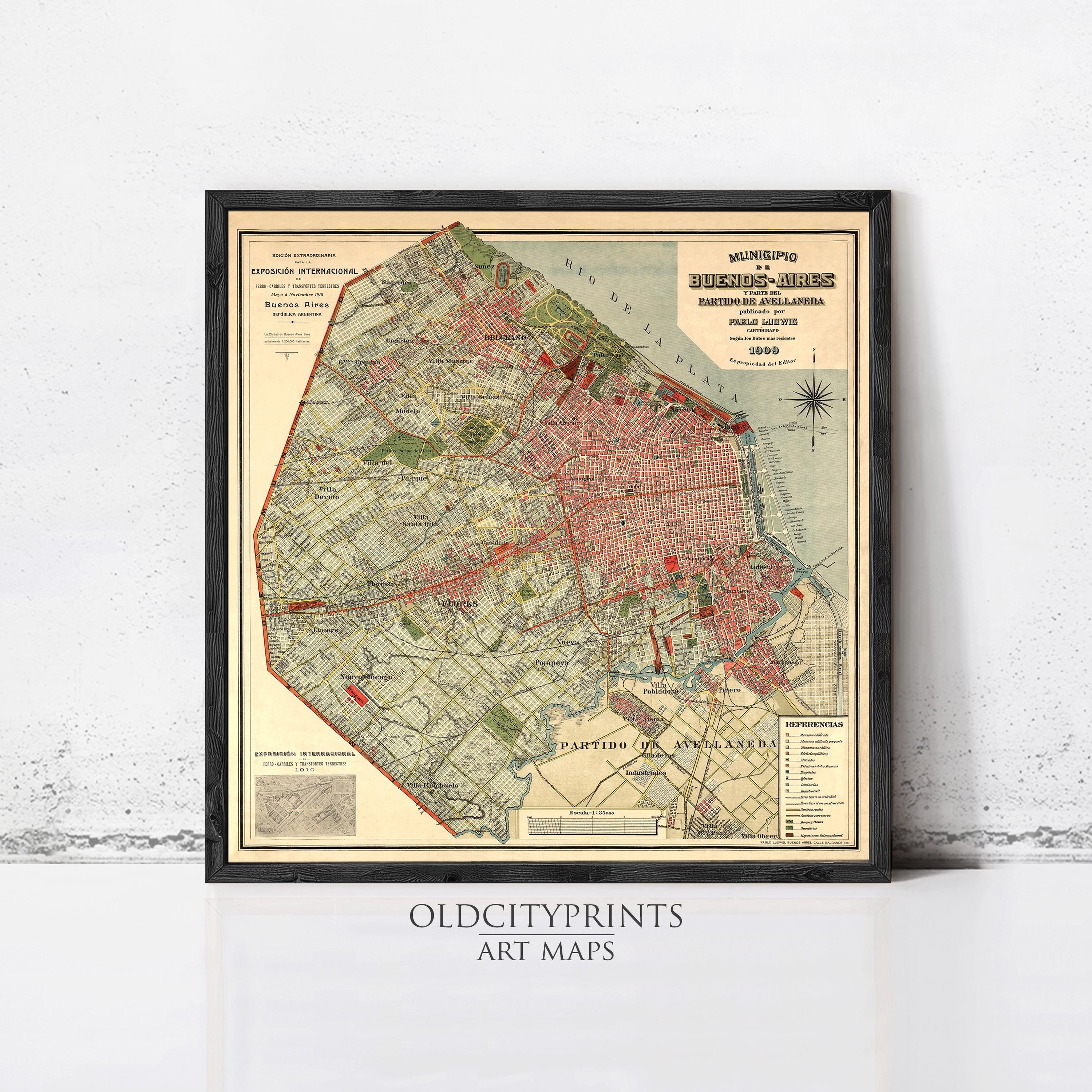 The image is a framed vintage map of a city, likely from the early 20th century, with a focus on the urban layout and surrounding areas.