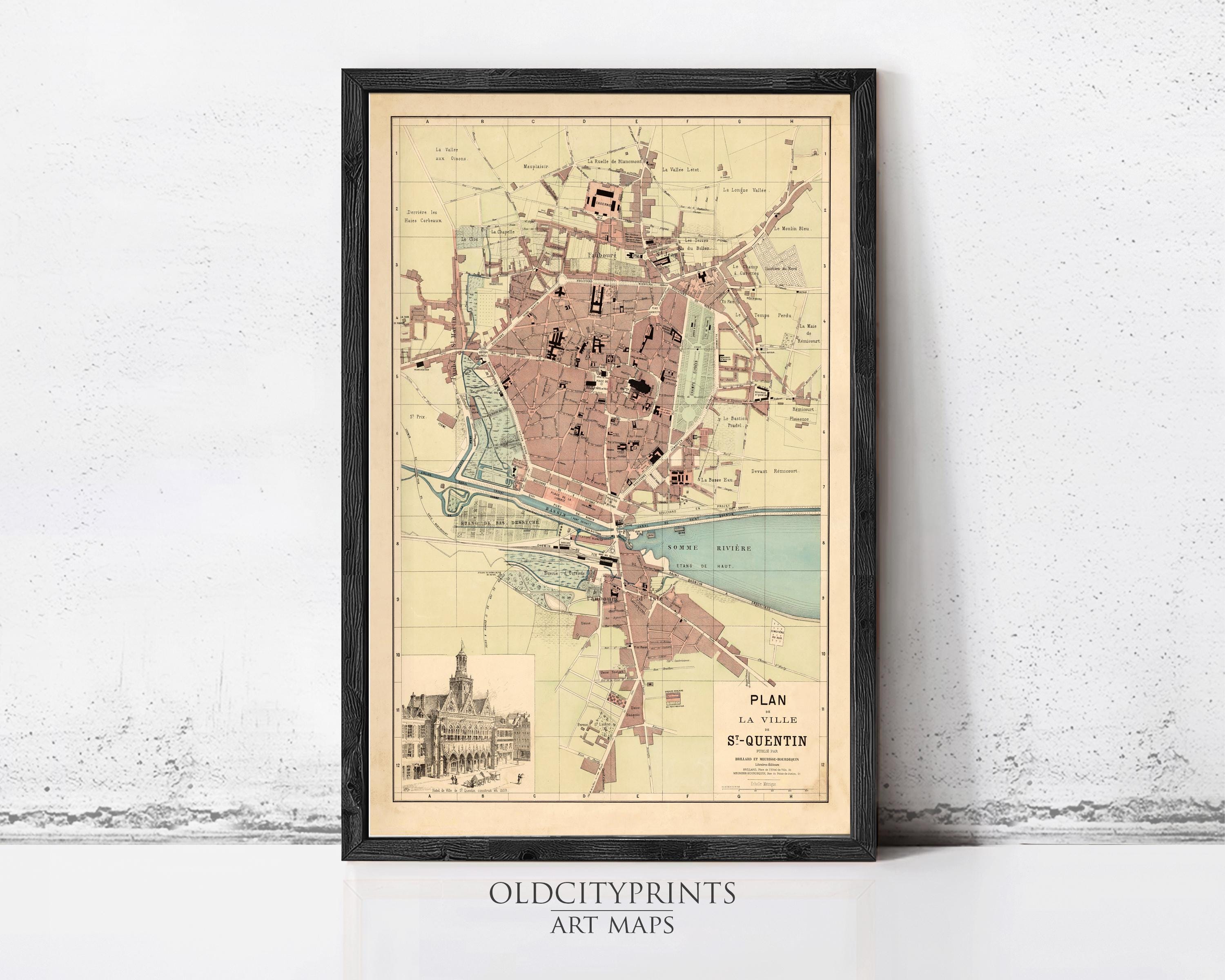 The image is a framed vintage map of a city, likely from the 19th century, depicting the layout and streets of the city.