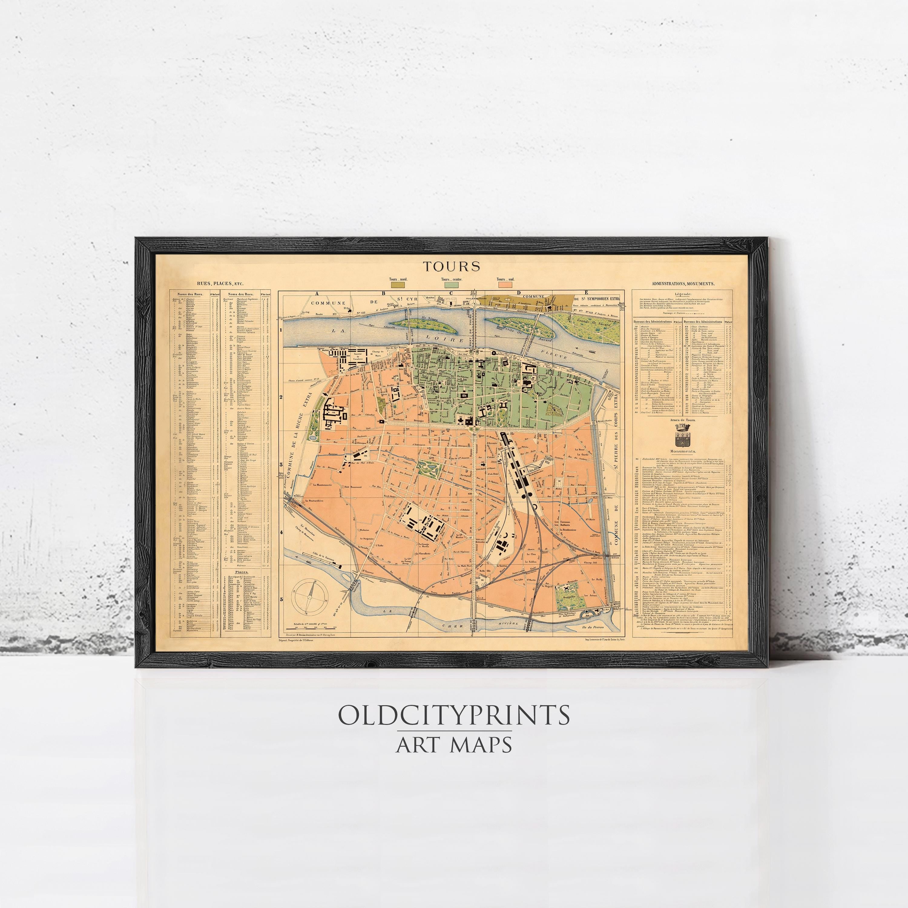 The image is a framed vintage map of a city, likely from the early 20th century, with detailed street maps and labels.
