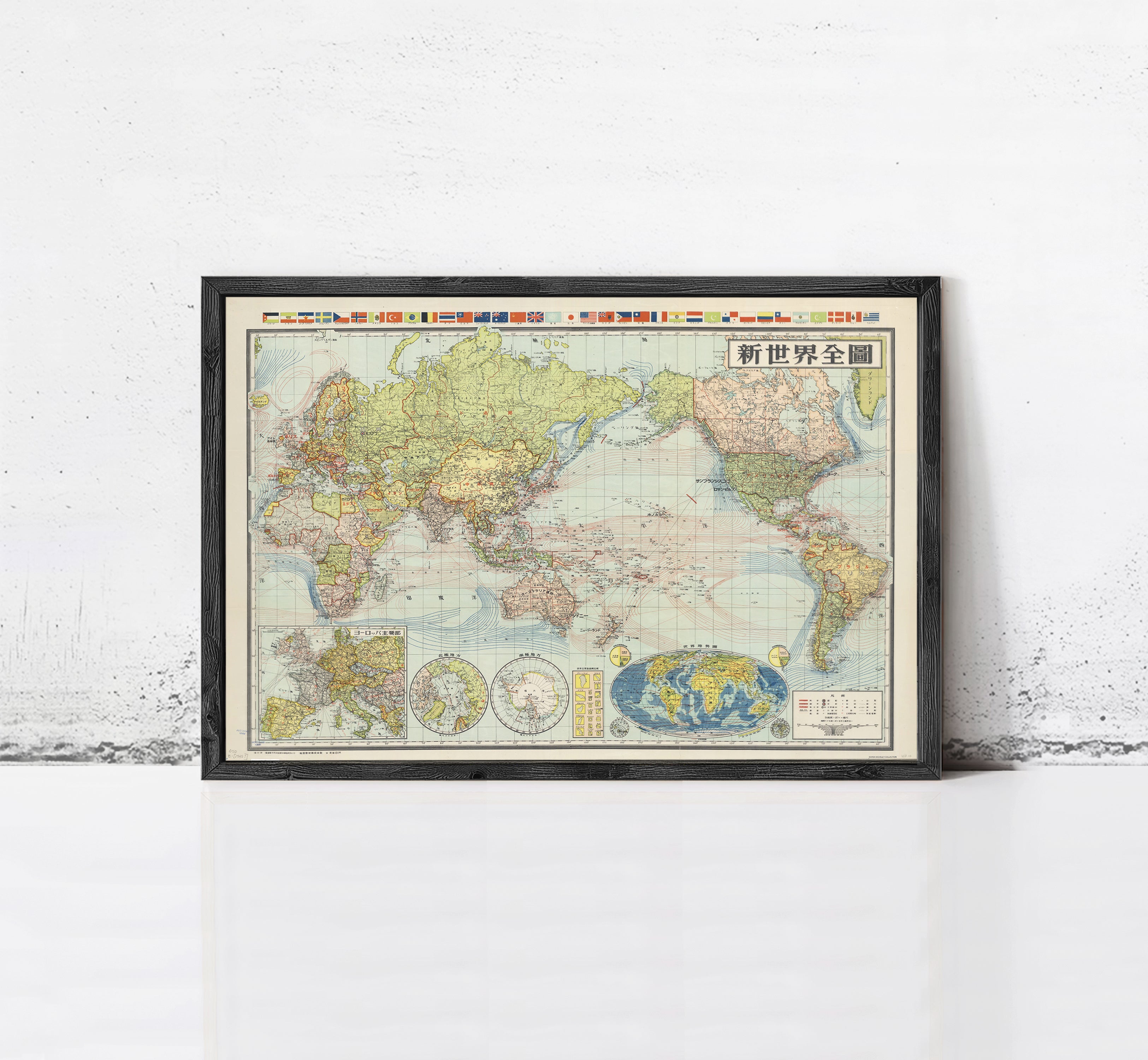 The image is a framed vintage map of the world, depicting various countries and regions with their respective flags.