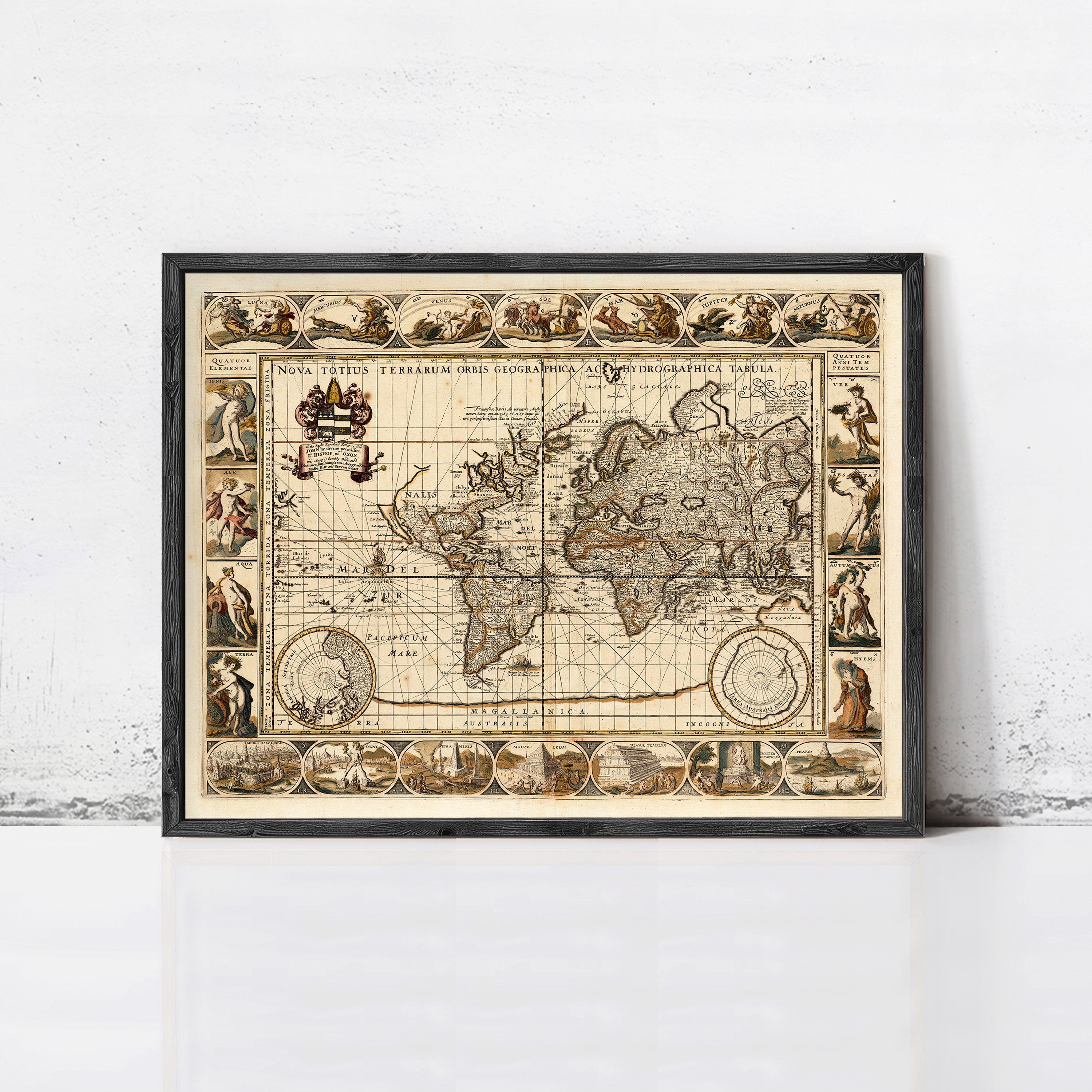 The image is a framed vintage map of the world, featuring intricate illustrations and detailed cartography.