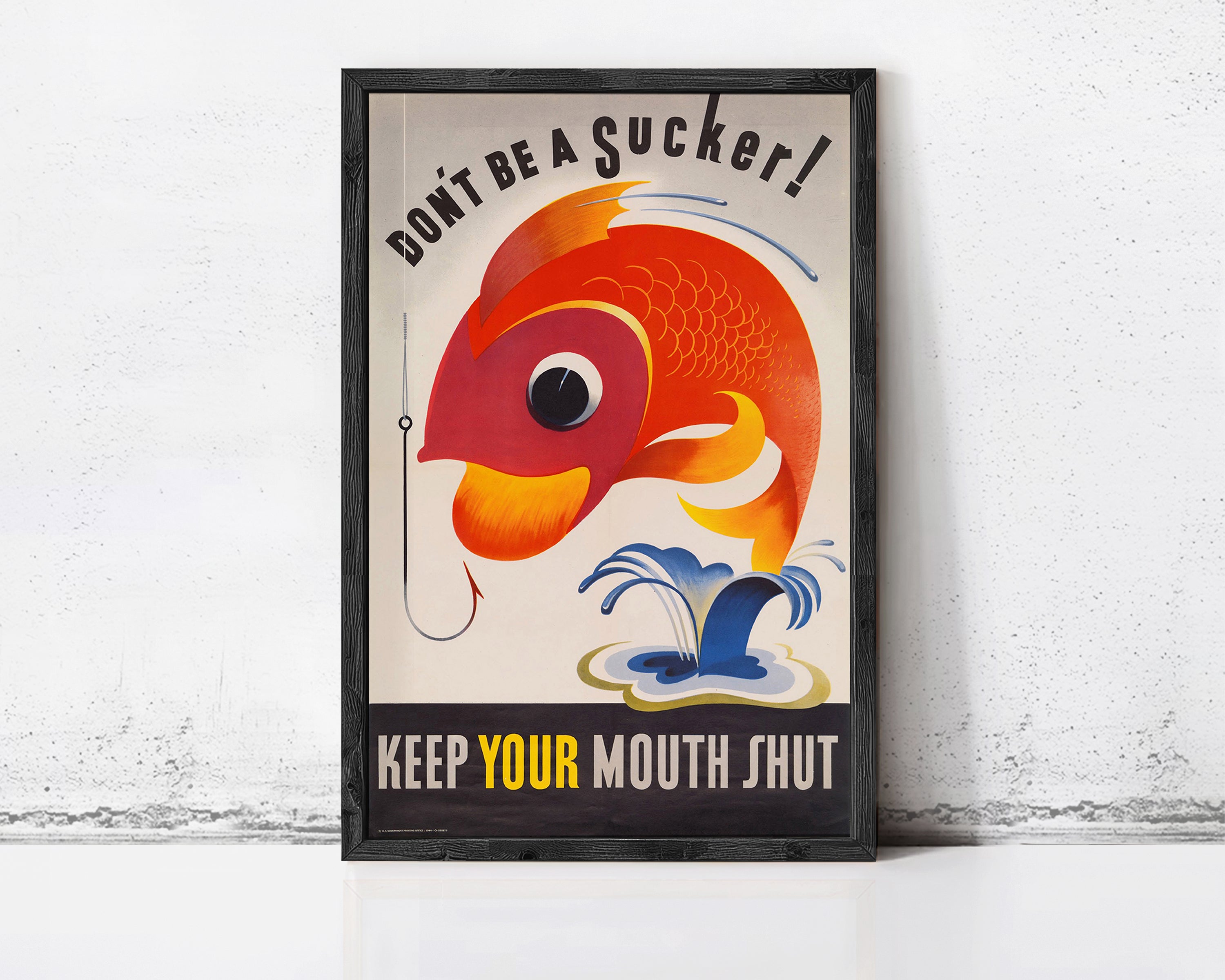 The image is a framed poster with a fish on it, and it contains a message about not being a sucker.
