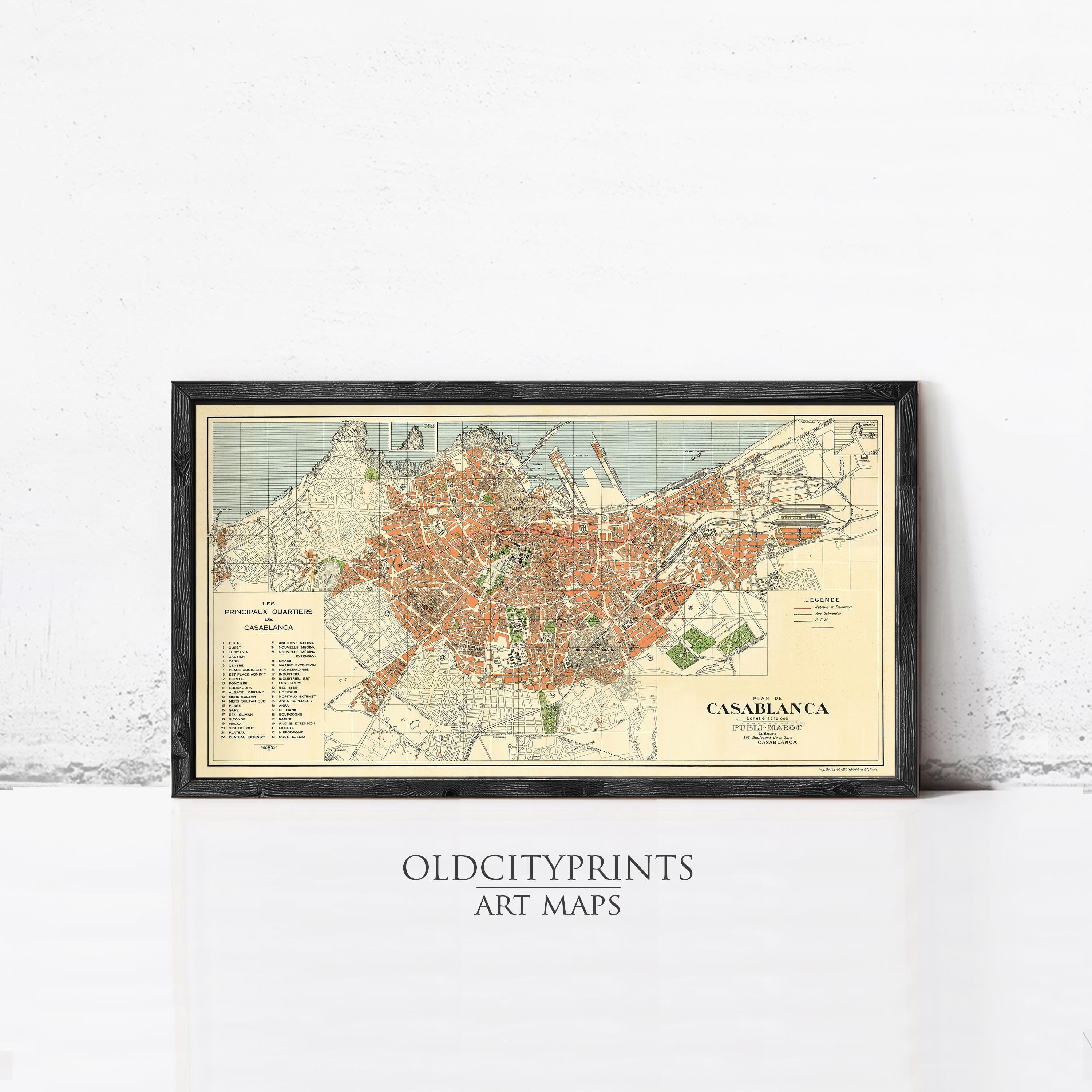 The image is a framed vintage map of Casablanca, Morocco, with a black border and a white background.