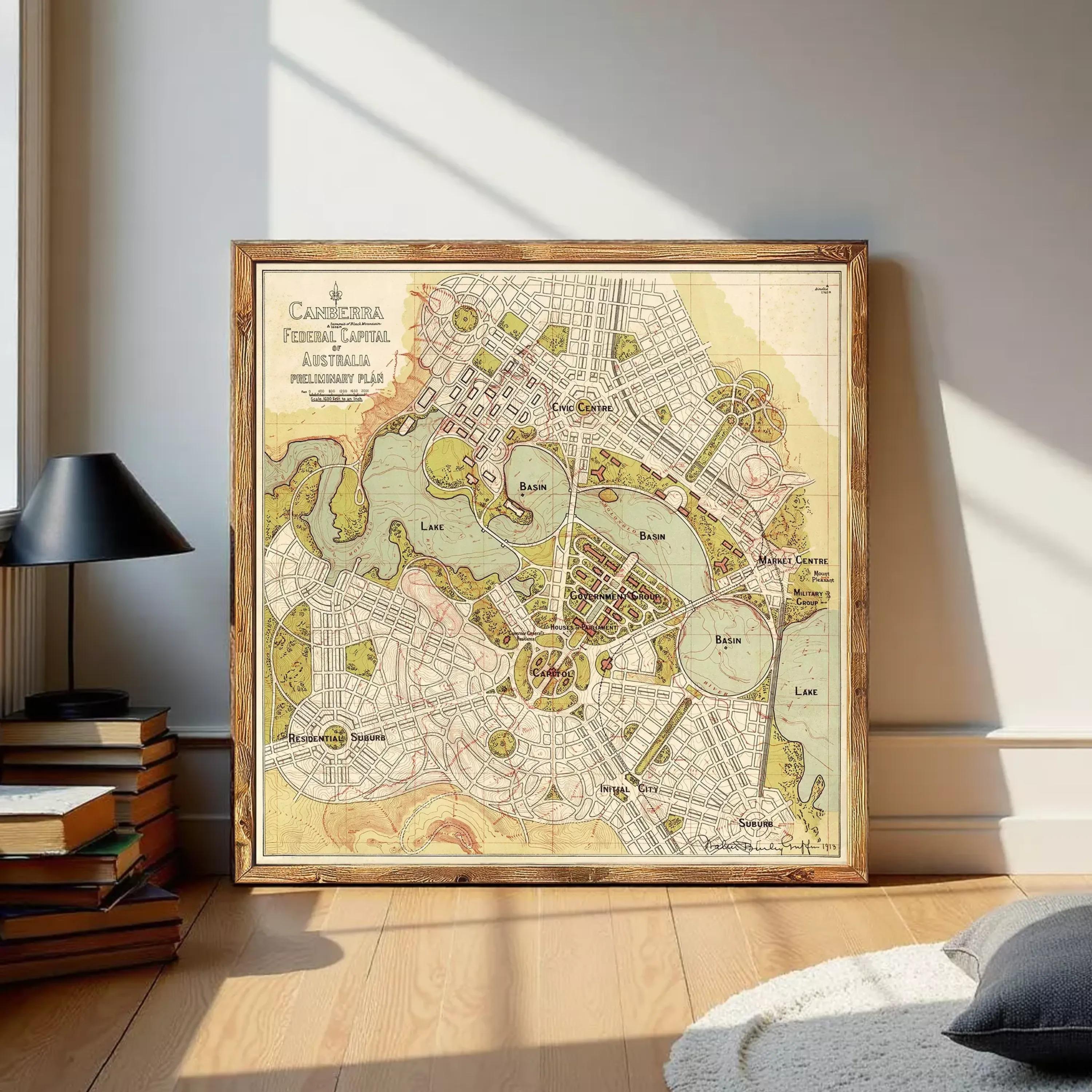 The image is a framed vintage map of a city, depicting various landmarks and streets.