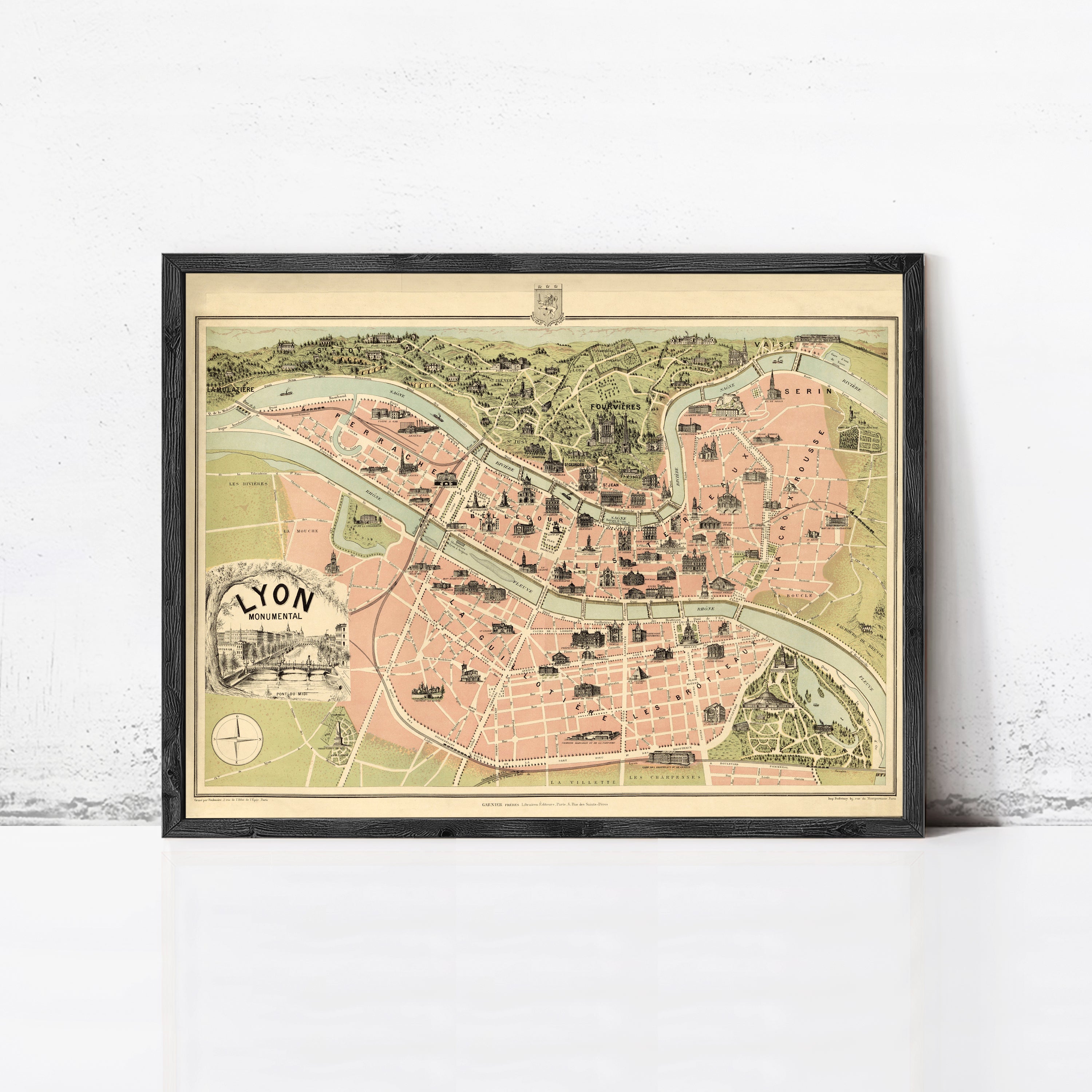 The image is a framed vintage map of Lyon, France, depicting the city's layout and surrounding areas.
