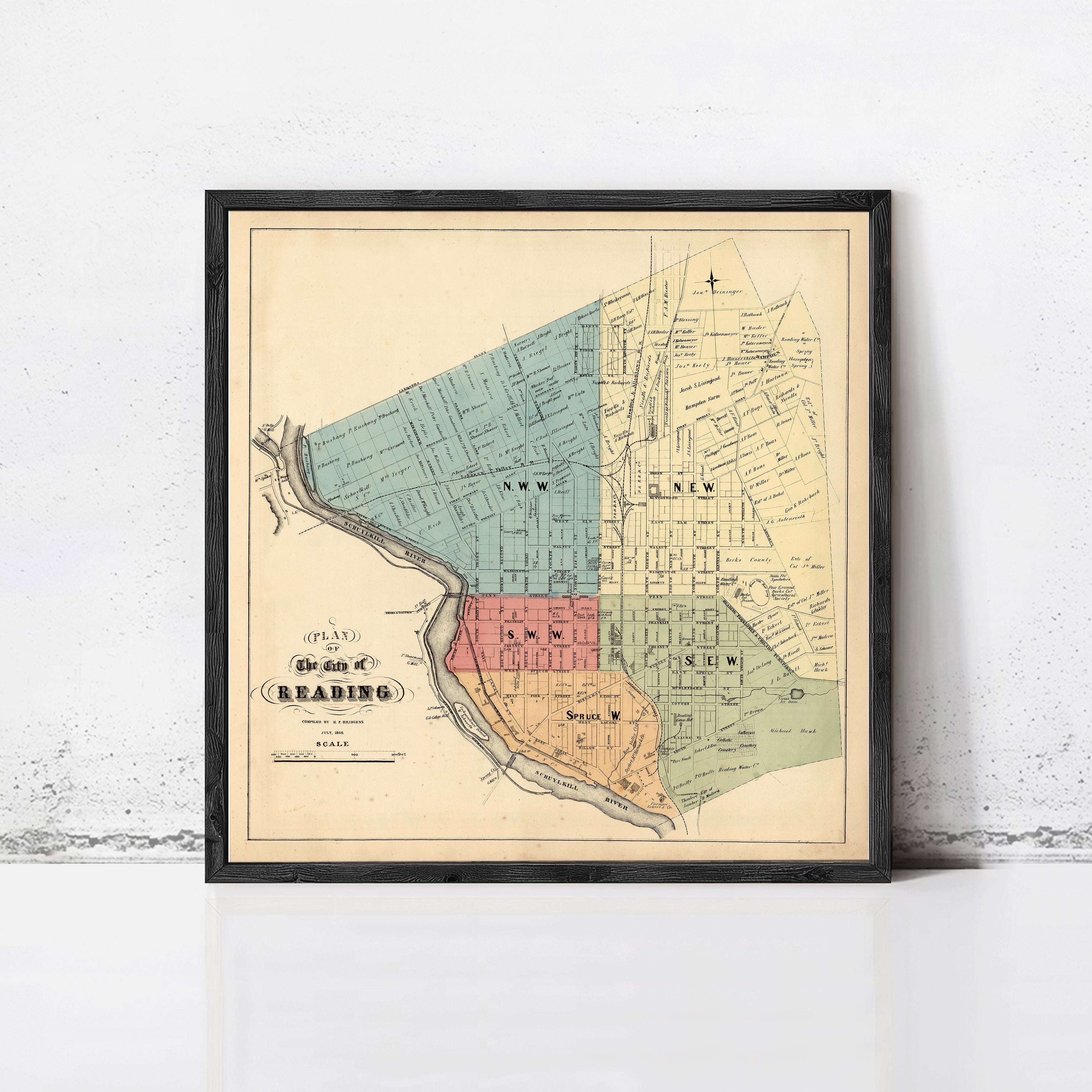 The image is a framed vintage map of Reading, Massachusetts, depicting the city's layout and boundaries.