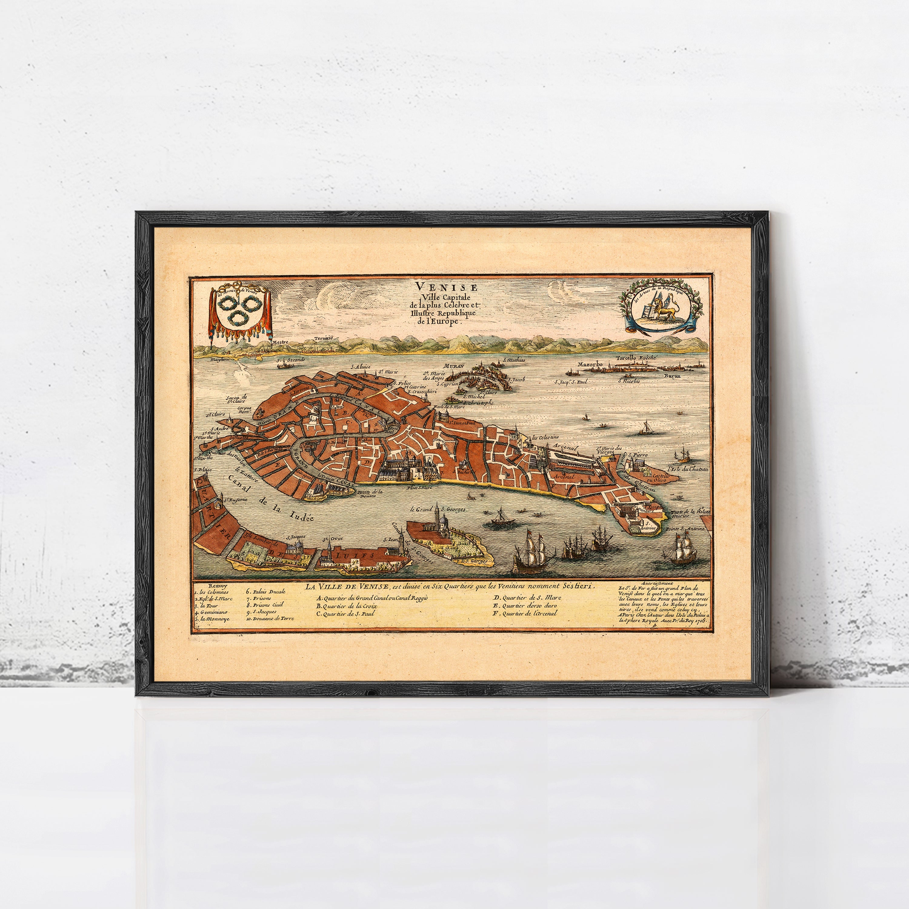 The image is a framed vintage map of Venice, Italy, depicting the city's layout and surrounding waterways.