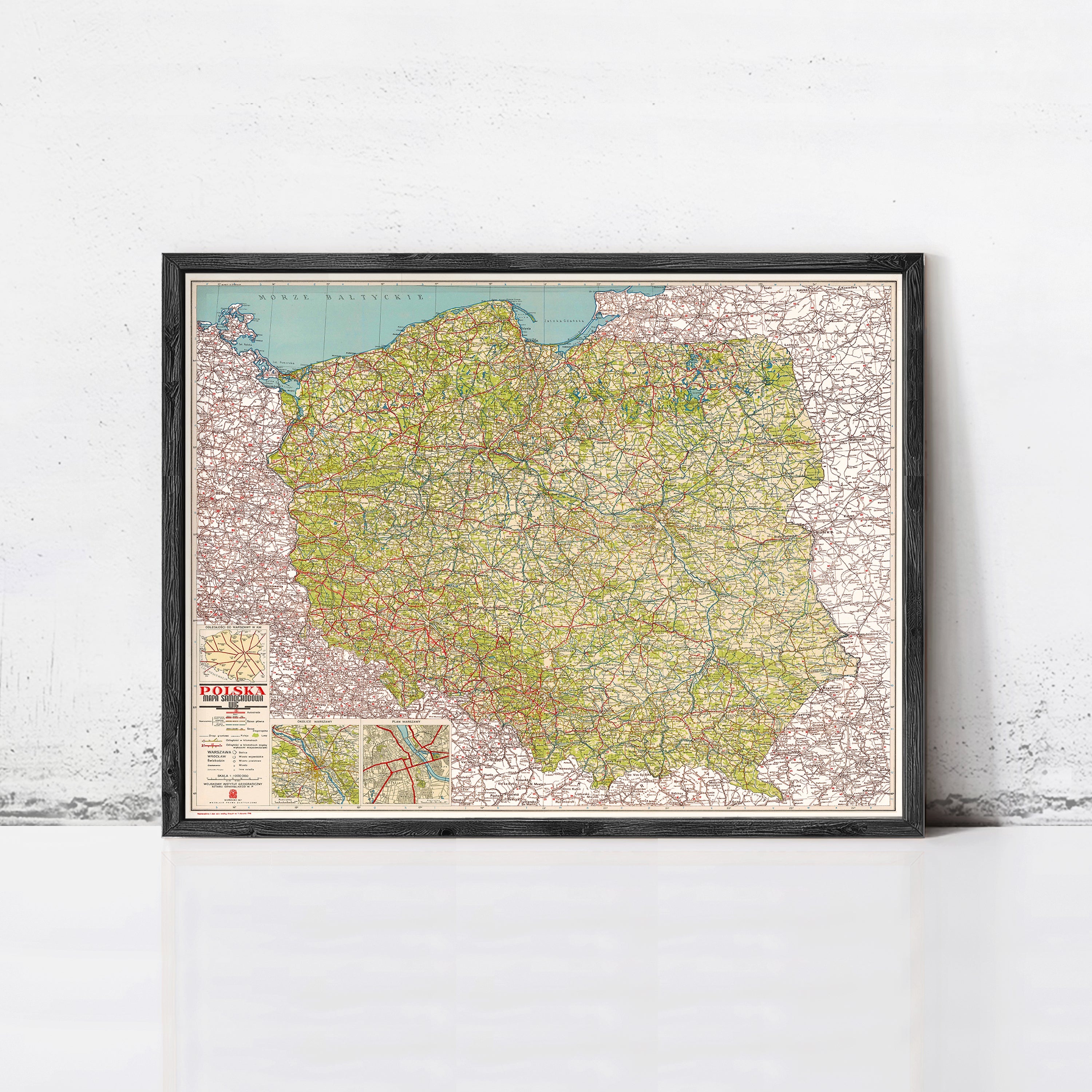 The image is a framed map of Poland, showing the country's roads and geographical layout.
