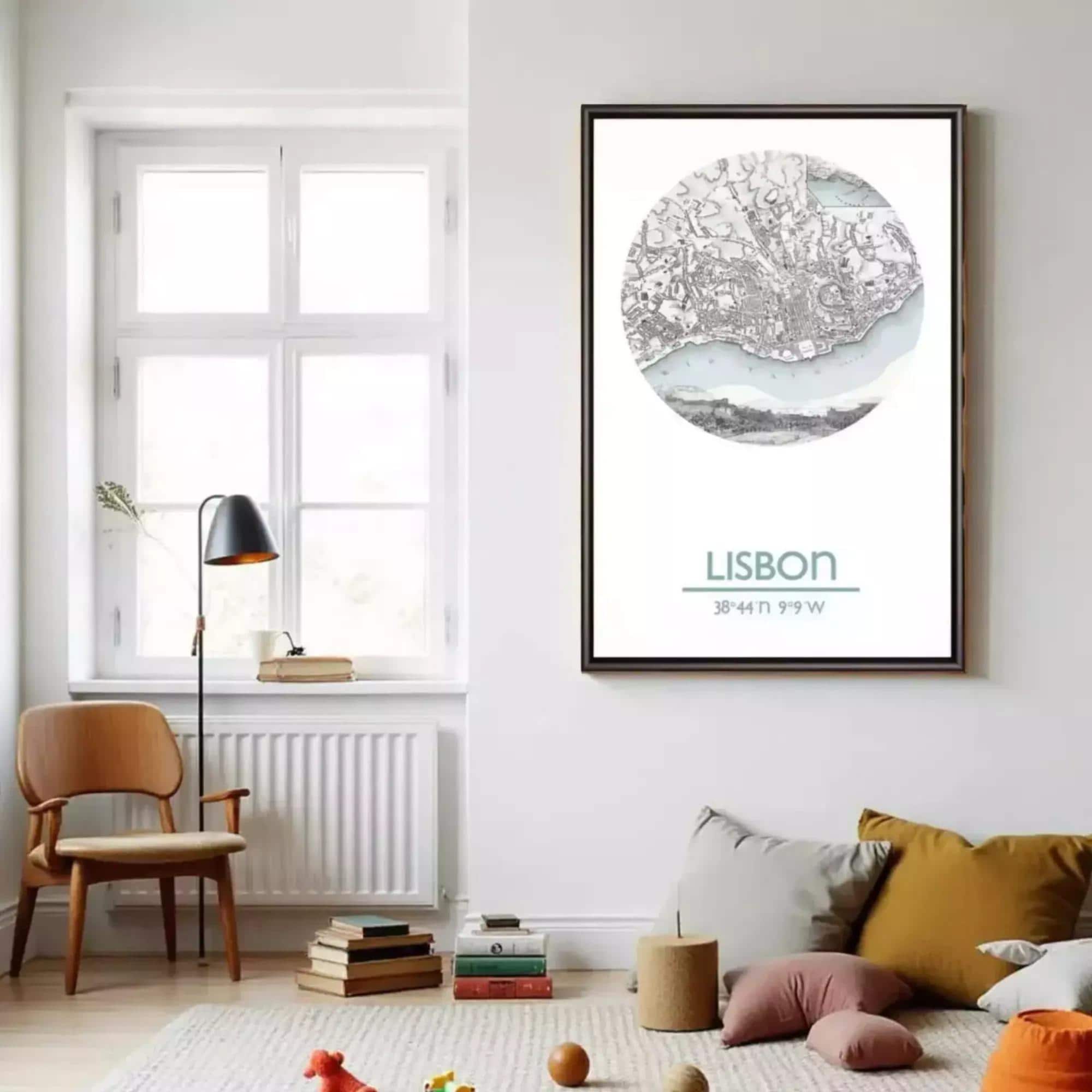 a cozy living room with a large framed map of Lisbon hanging on the wall, a wooden chair, a stack of books, and a small table with a lamp.