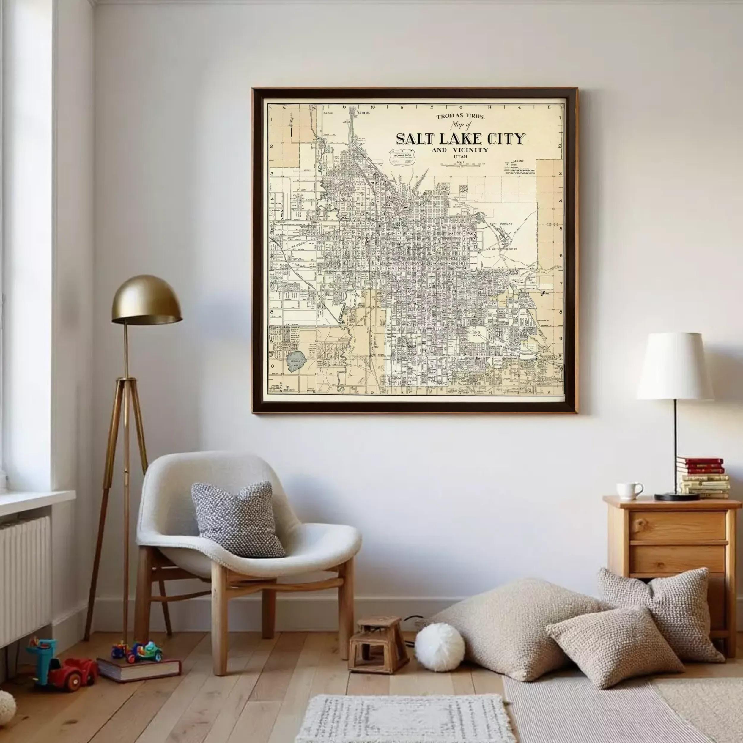 a large framed map of Salt Lake City, Utah, hanging on a wall in a cozy living room setting.