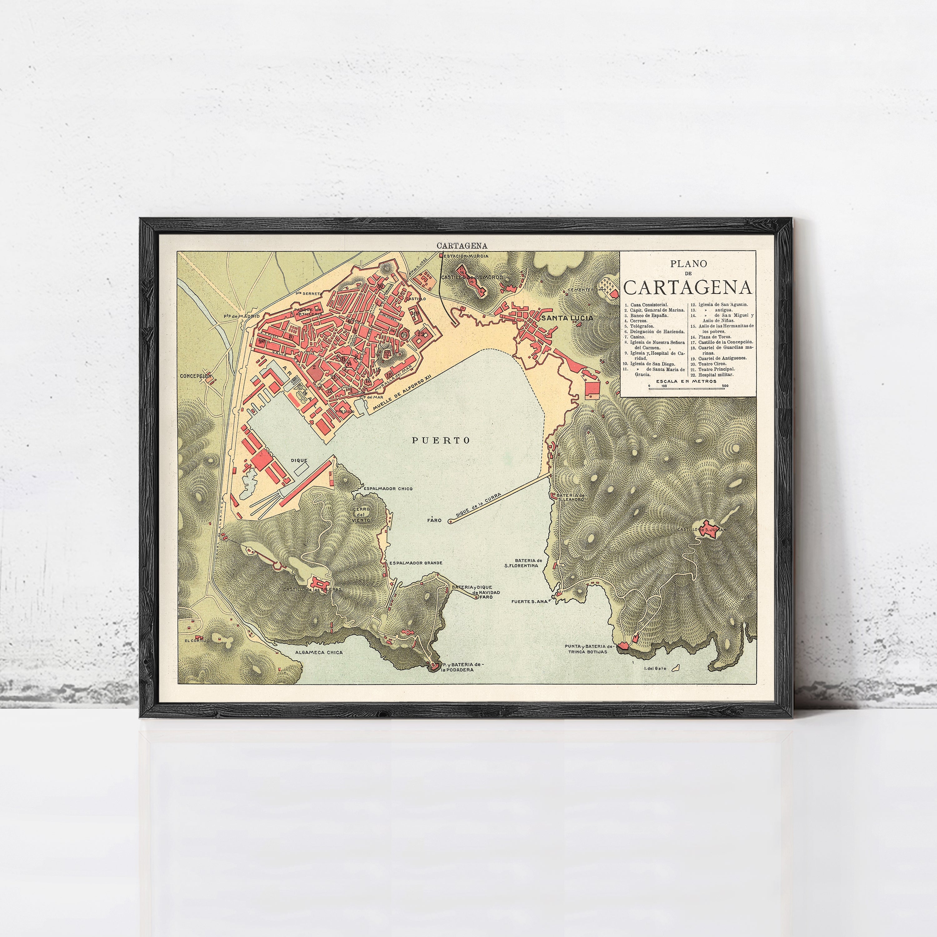 The image is a framed vintage map of Cartagena, Colombia, showing the city's layout and surrounding areas.