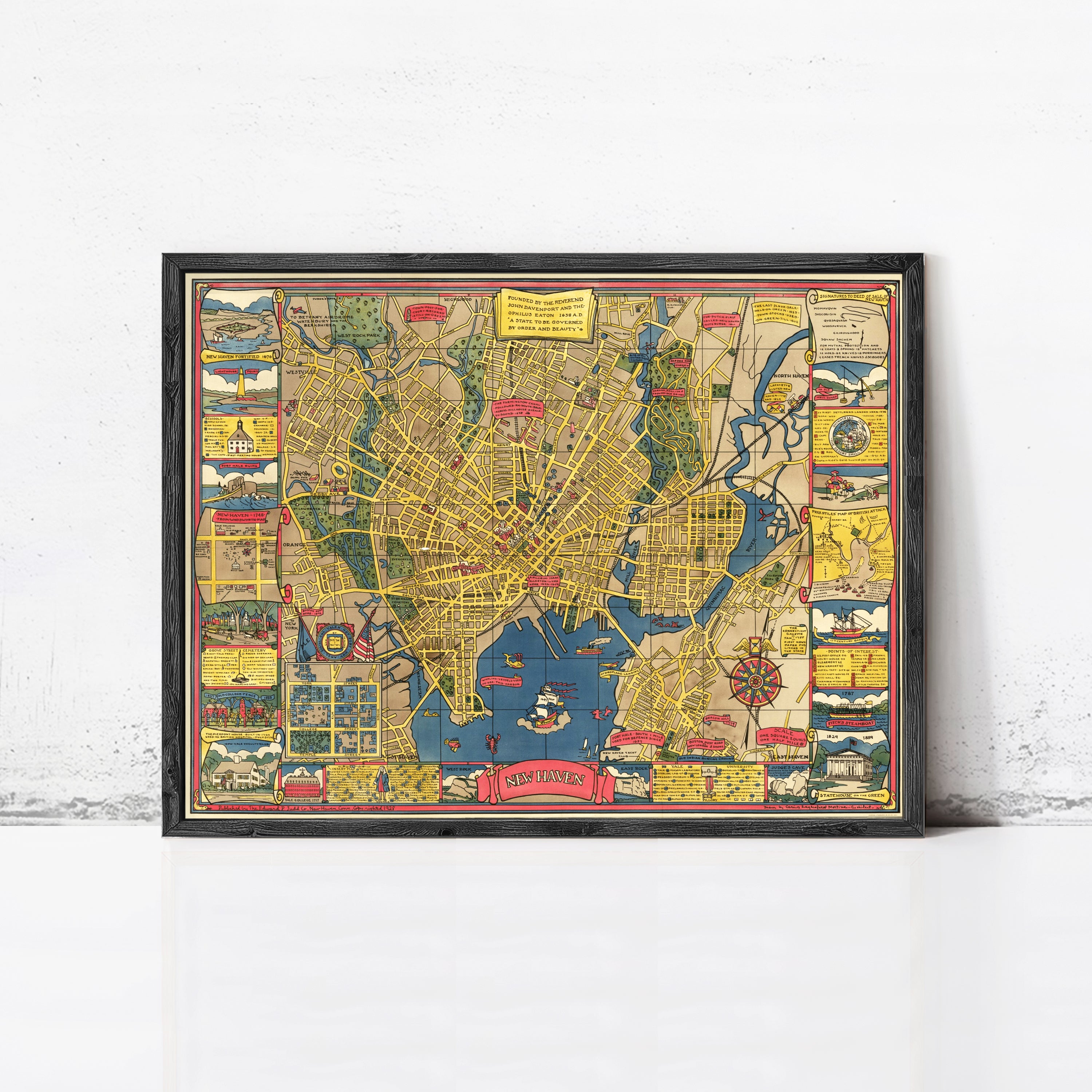 The image is a framed vintage map of a city, likely New York, with various landmarks and streets depicted in a colorful and detailed manner.