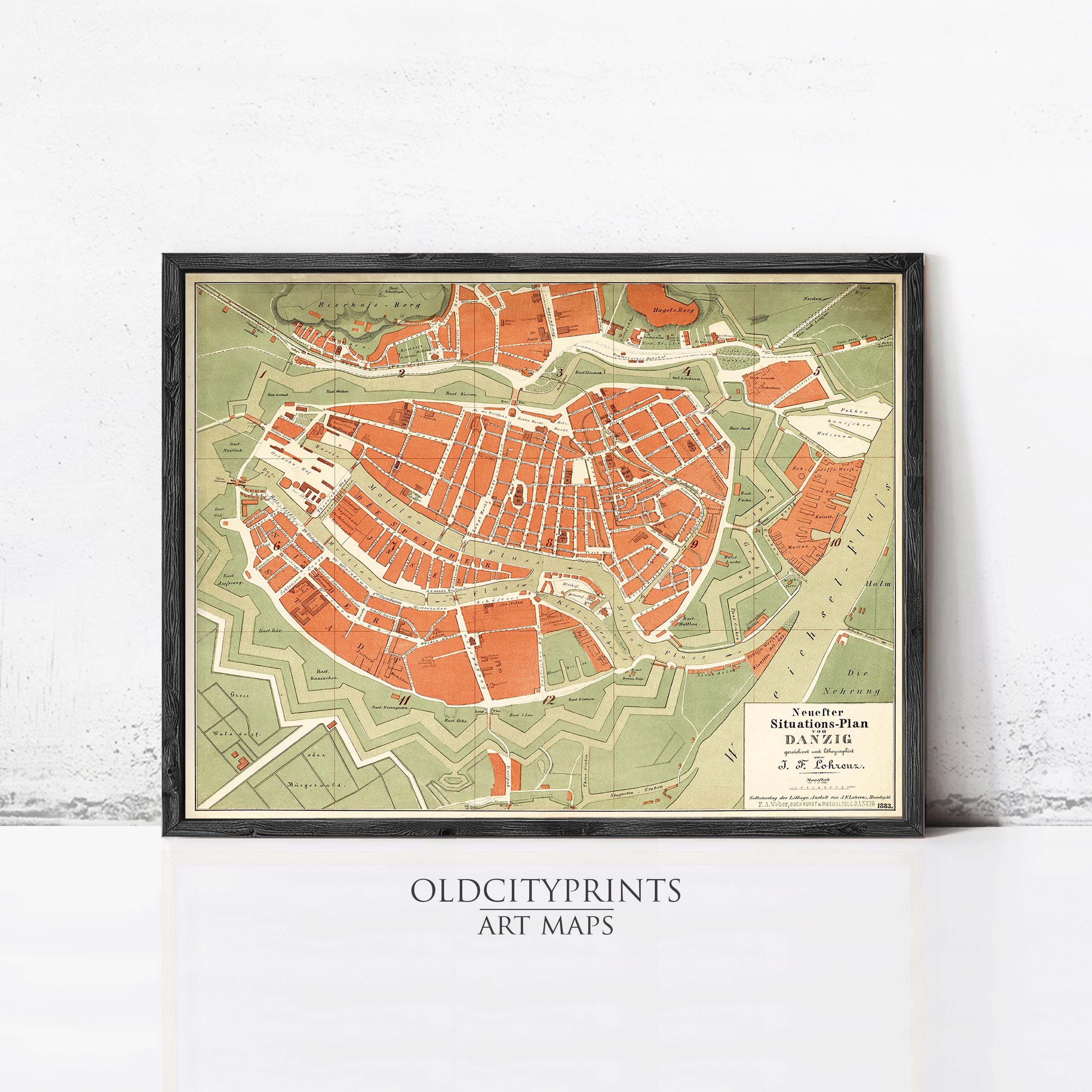 The image is a framed art map of a city, depicting the layout and streets of the area.