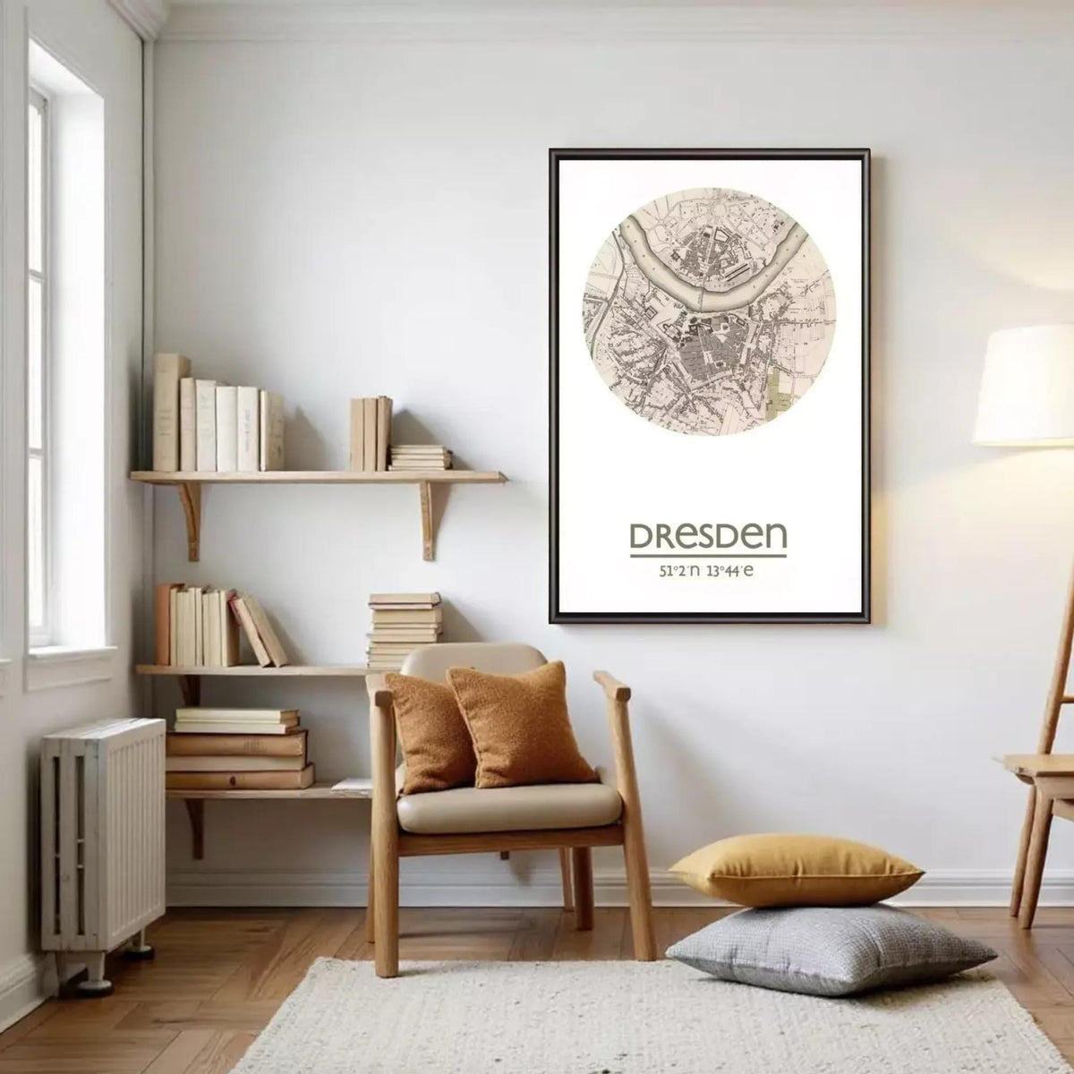 a cozy living room with a large framed map of Dresden, Germany, hanging on the wall. The room is furnished with a wooden chair, a bookshelf filled with books, and a rug on the floor.
