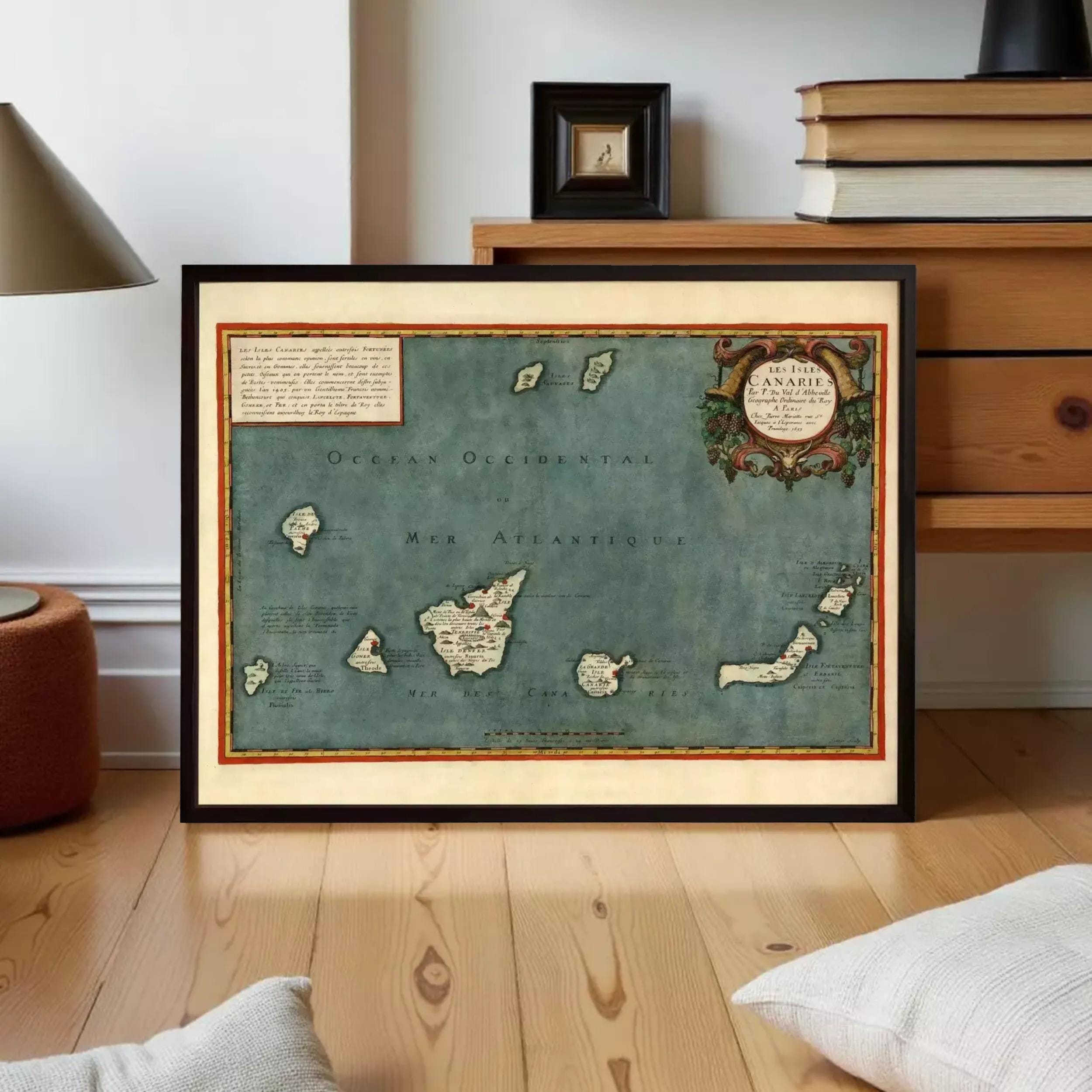 a framed map of the Atlantic Ocean, with a decorative border and text that appears to be a historical map of the Atlantic Ocean.