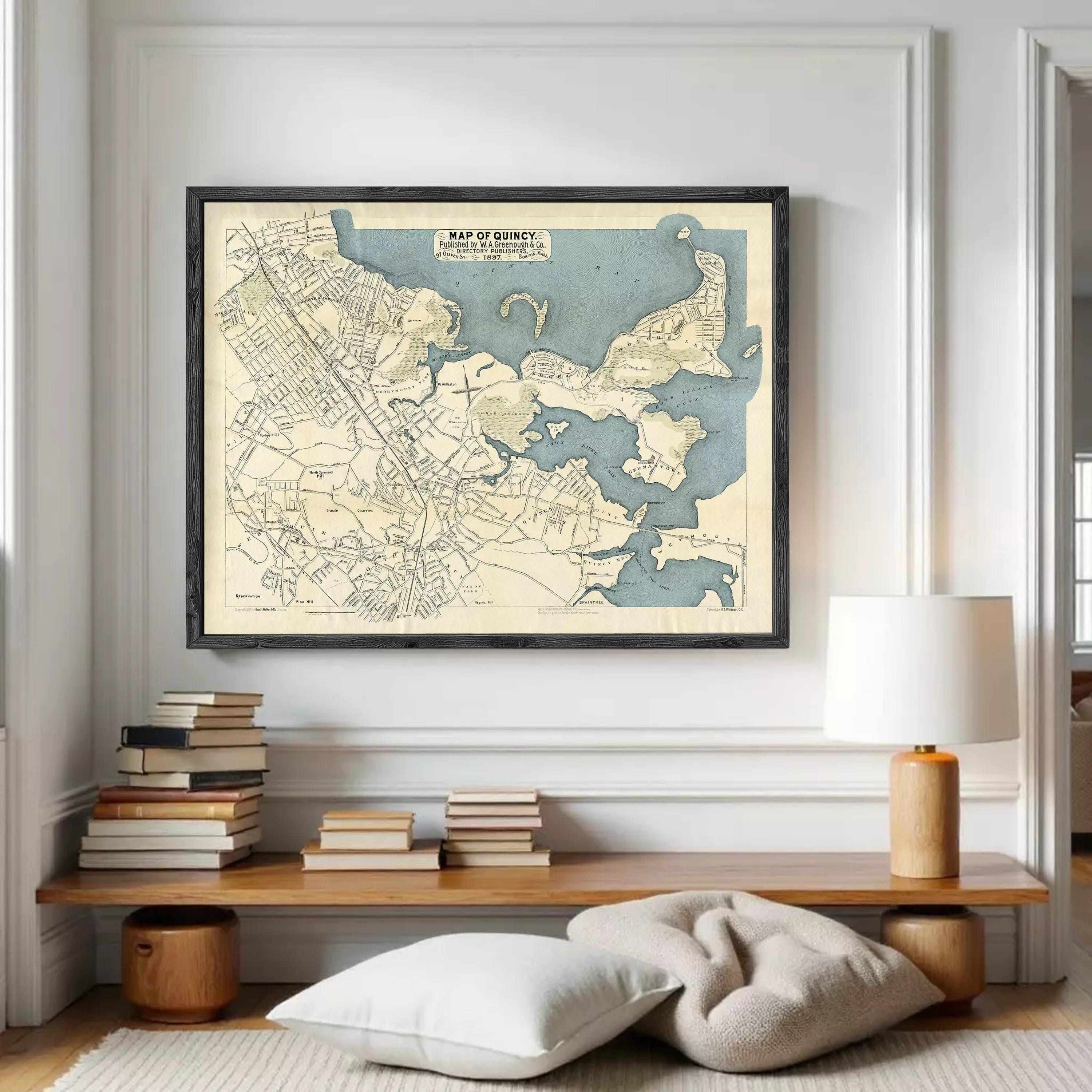 The image is a framed map of the city of Boston, Massachusetts, depicting the streets, landmarks, and surrounding areas.
