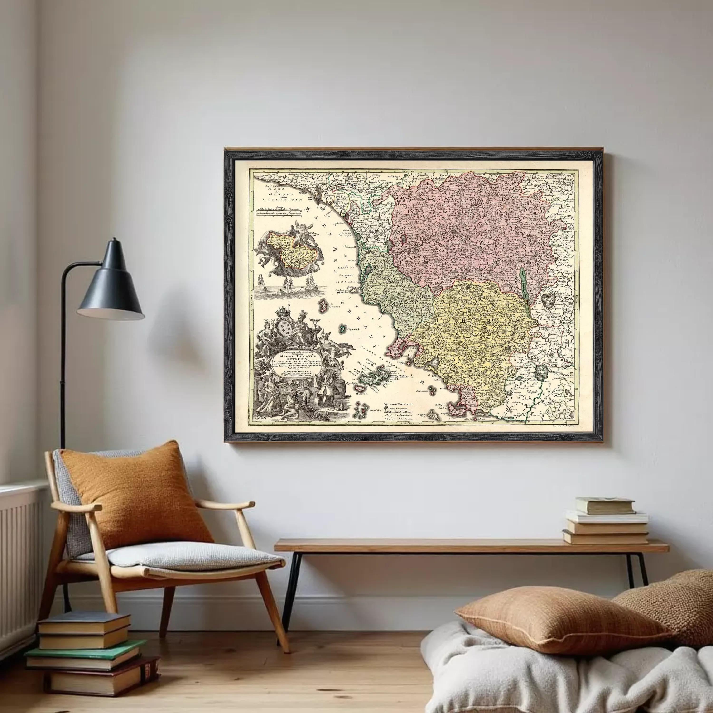 The image is a framed antique map of Europe, featuring detailed illustrations and color-coded regions.