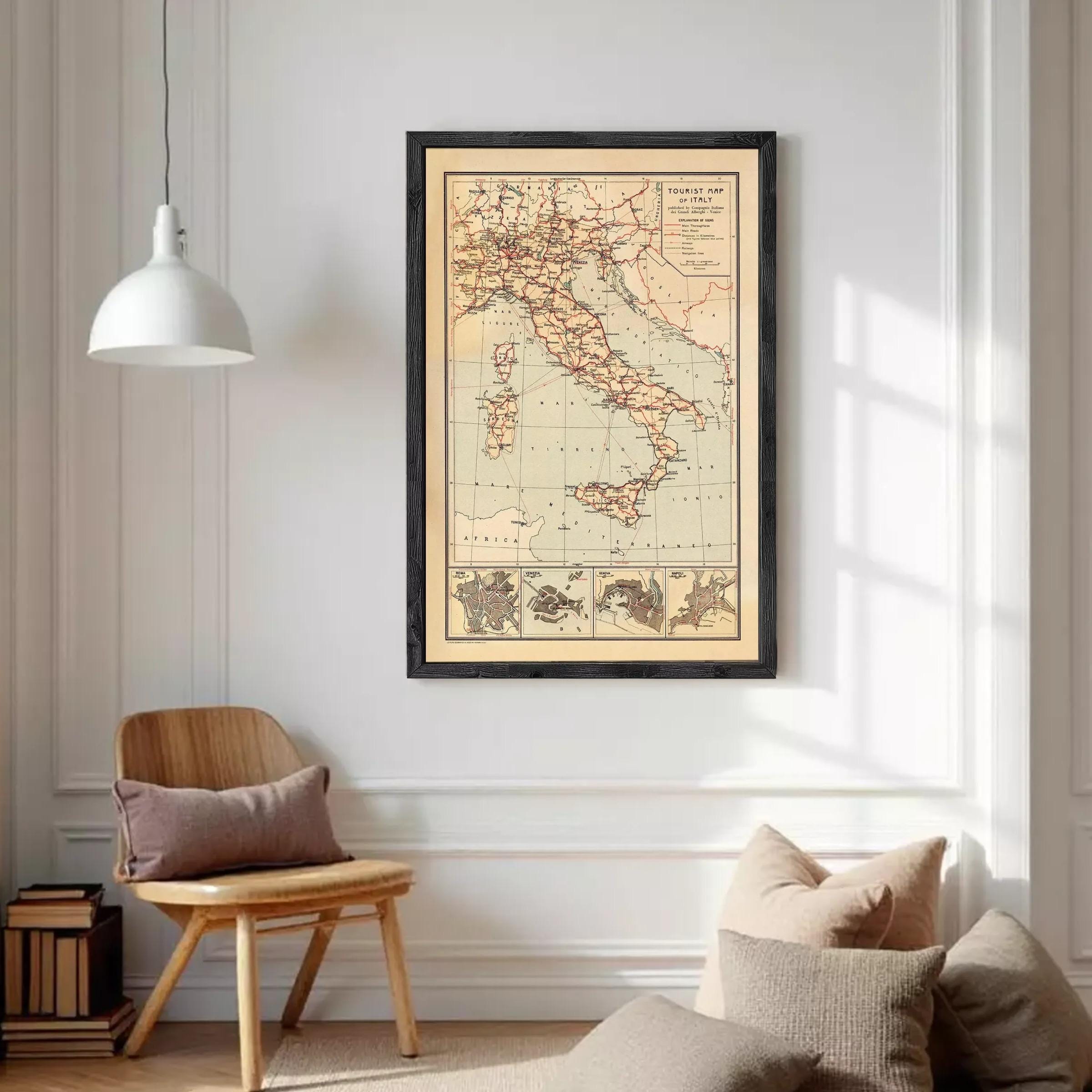 The image is a framed vintage map of Italy, showing the country's geographical layout and surrounding areas.