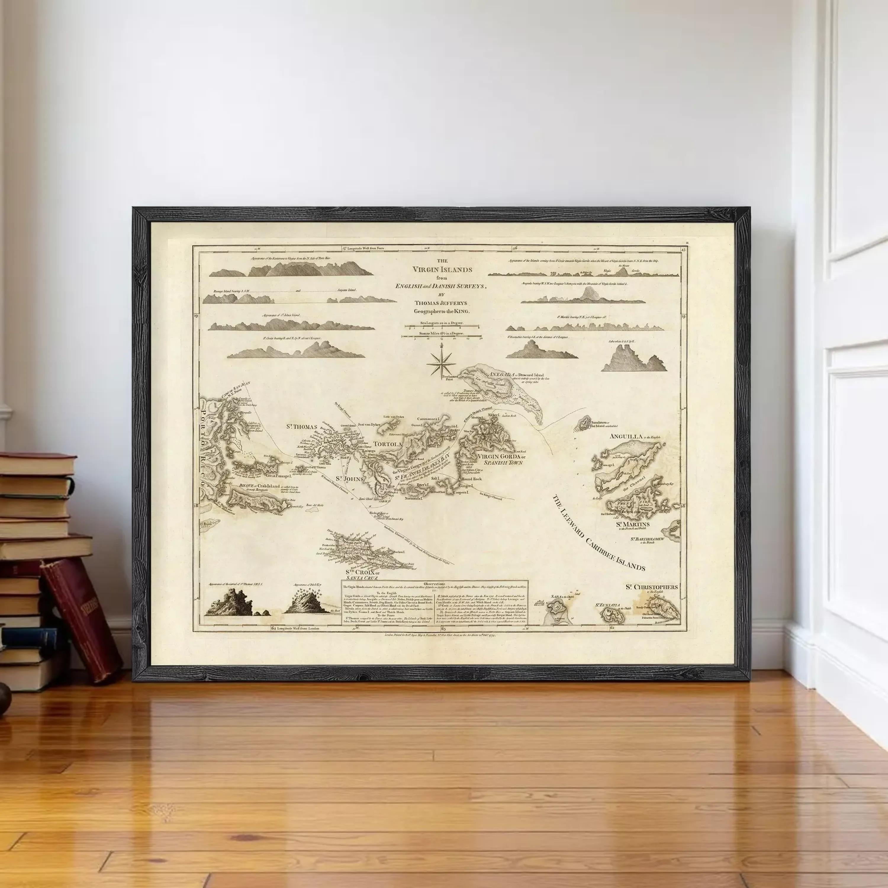 The image is a framed antique map of the world, depicting various geographical features and landmarks.