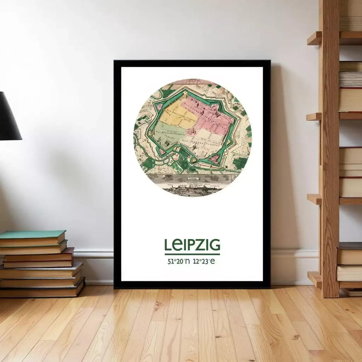 A framed poster of a map of Leipzig, Germany, with the text "LEIPZIG 51/20 11 12 23" below the map.