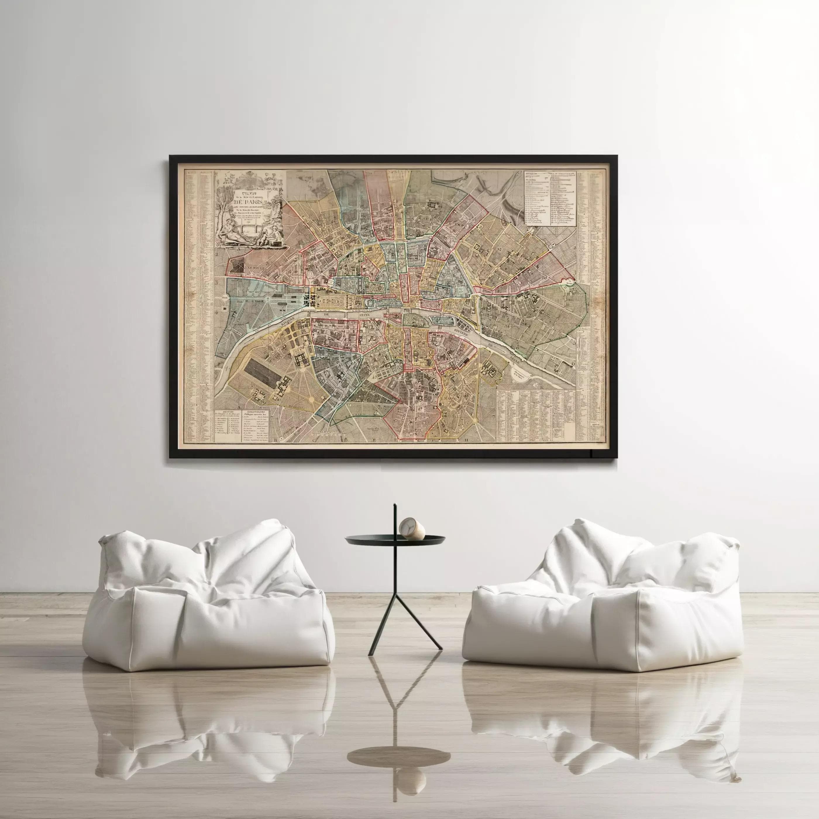 a large framed map of Paris, with two white bean bag chairs positioned in front of it, creating a cozy and inviting atmosphere.