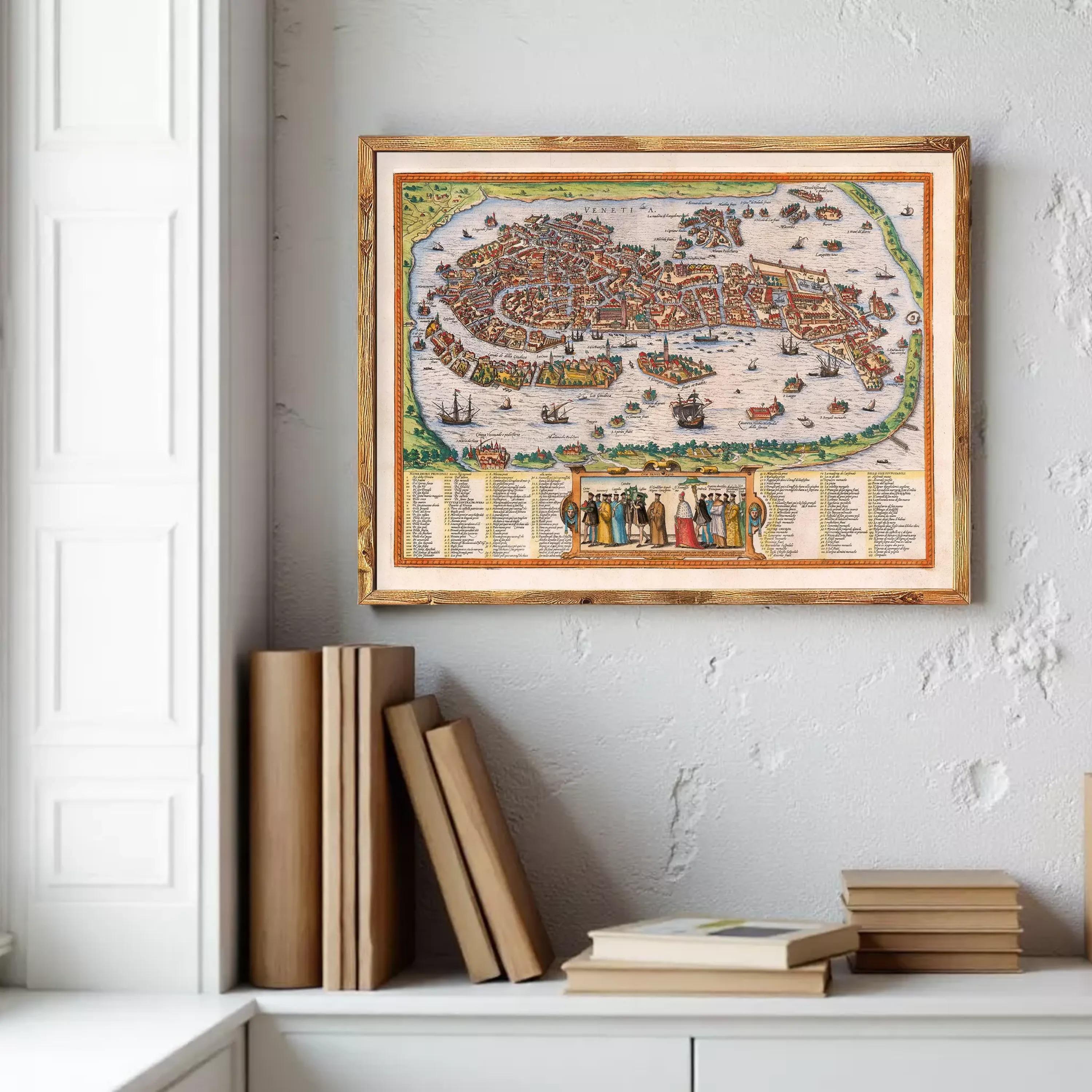 a framed map of Venice hanging on a wall, surrounded by a collection of books and other items on a shelf or table.