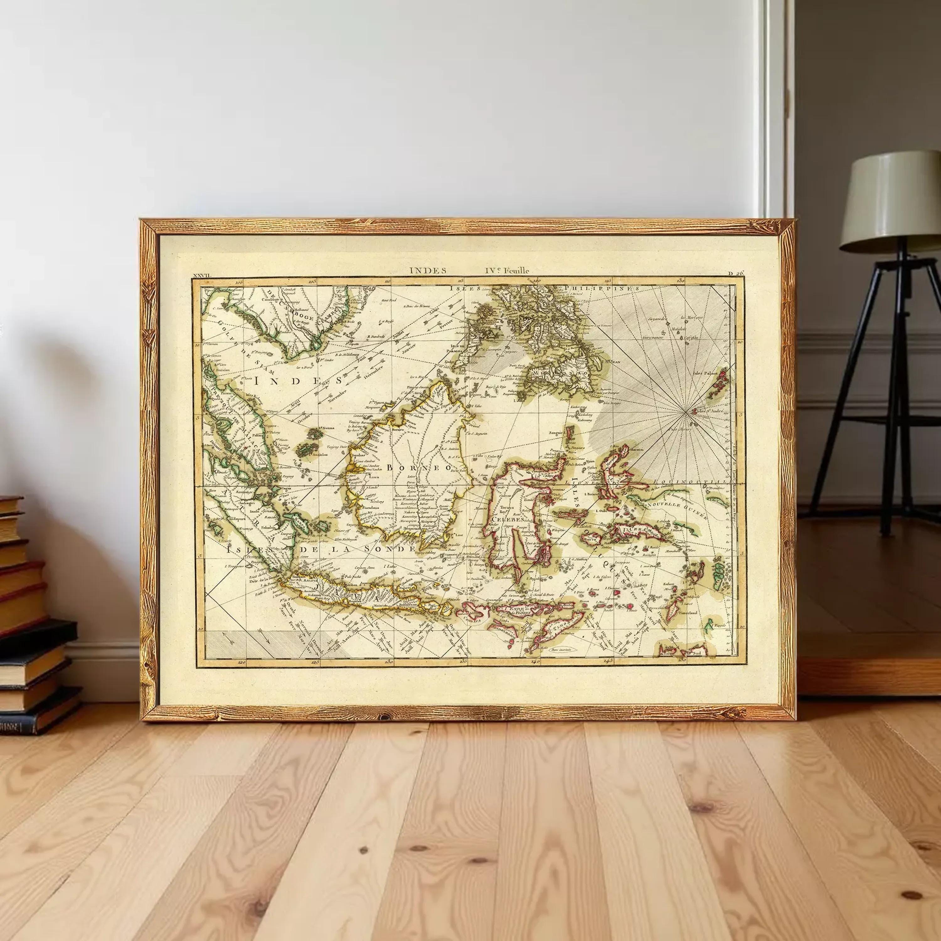 a large, framed map of the world, likely from the 17th century, displayed on a wooden floor in a room.