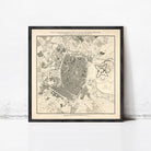 The image is a framed map of a city, depicting various landmarks and streets.
