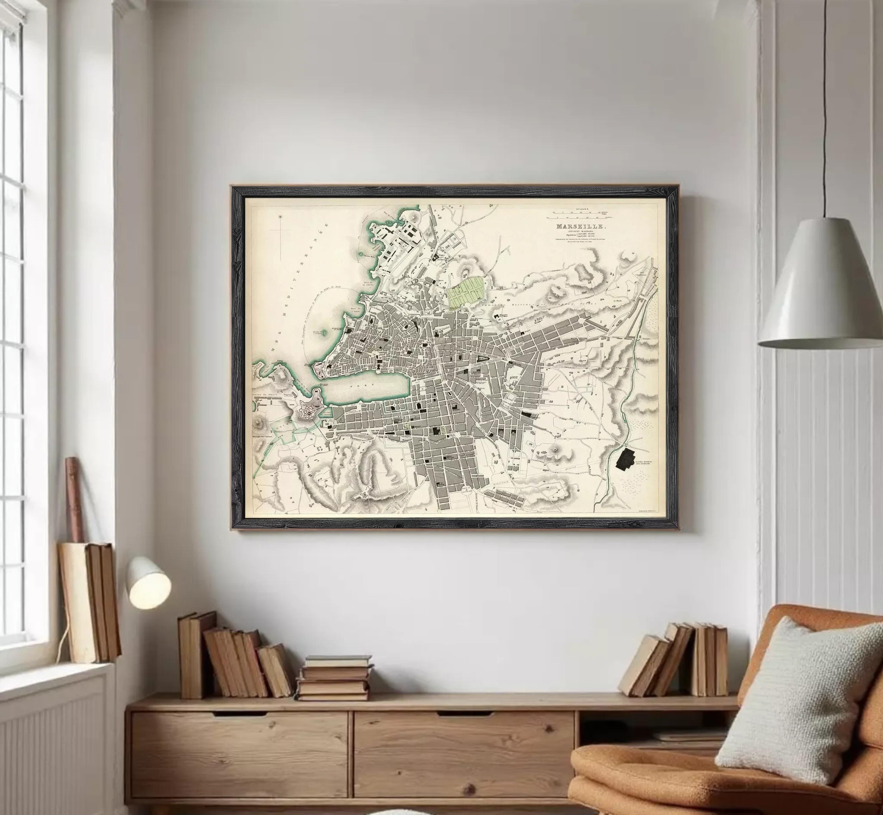 The image is a framed vintage map of a city, likely from the 19th century, depicting the layout and geographical features of the area.