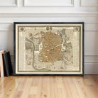 a large, framed map of a city or region, with detailed geographical information and various landmarks or points of interest.