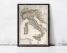 The image is a framed map of Italy, showing the country's geographical layout and surrounding areas.
