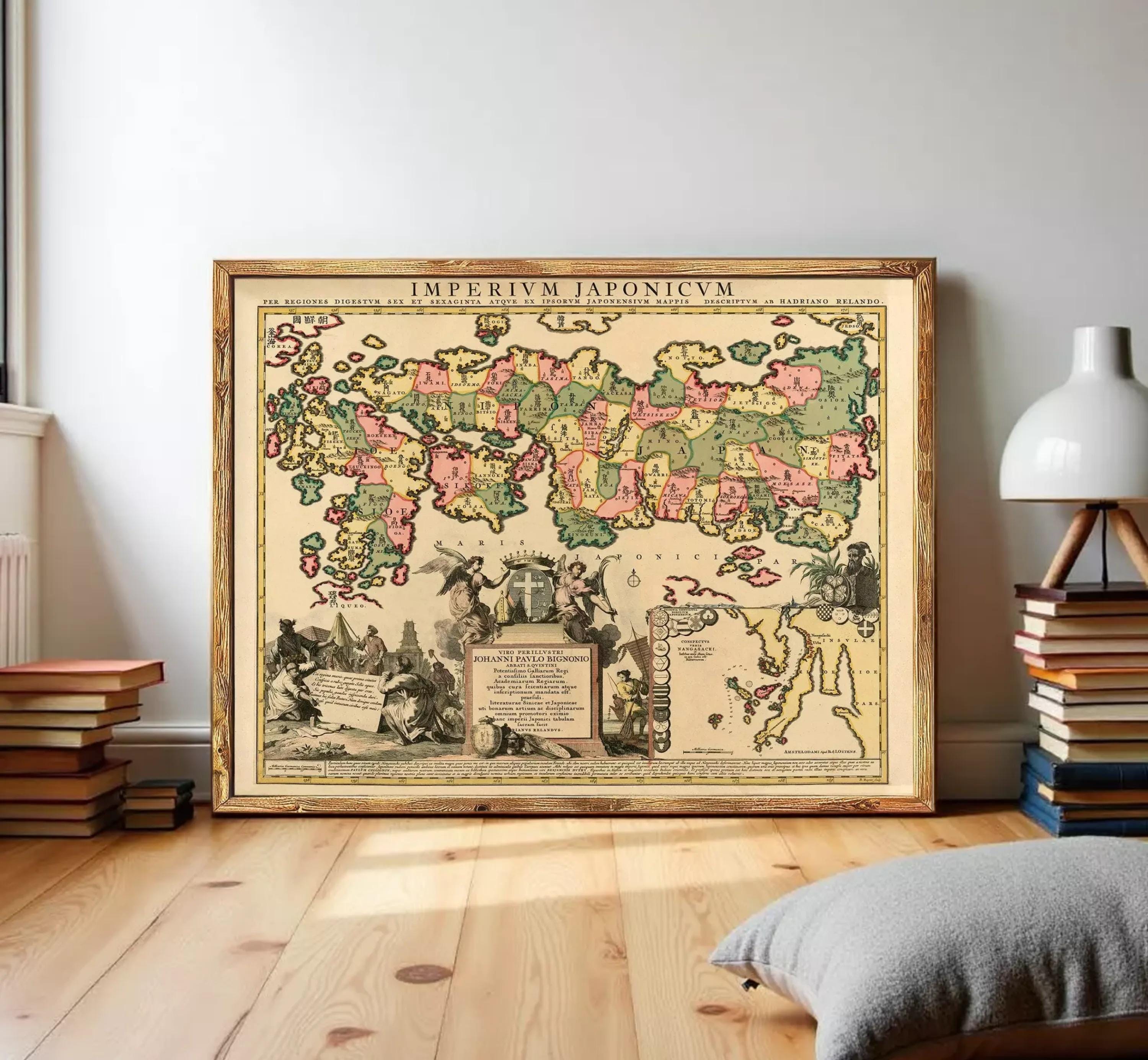 The image is a framed antique map of the world, depicting various regions and countries in different colors.