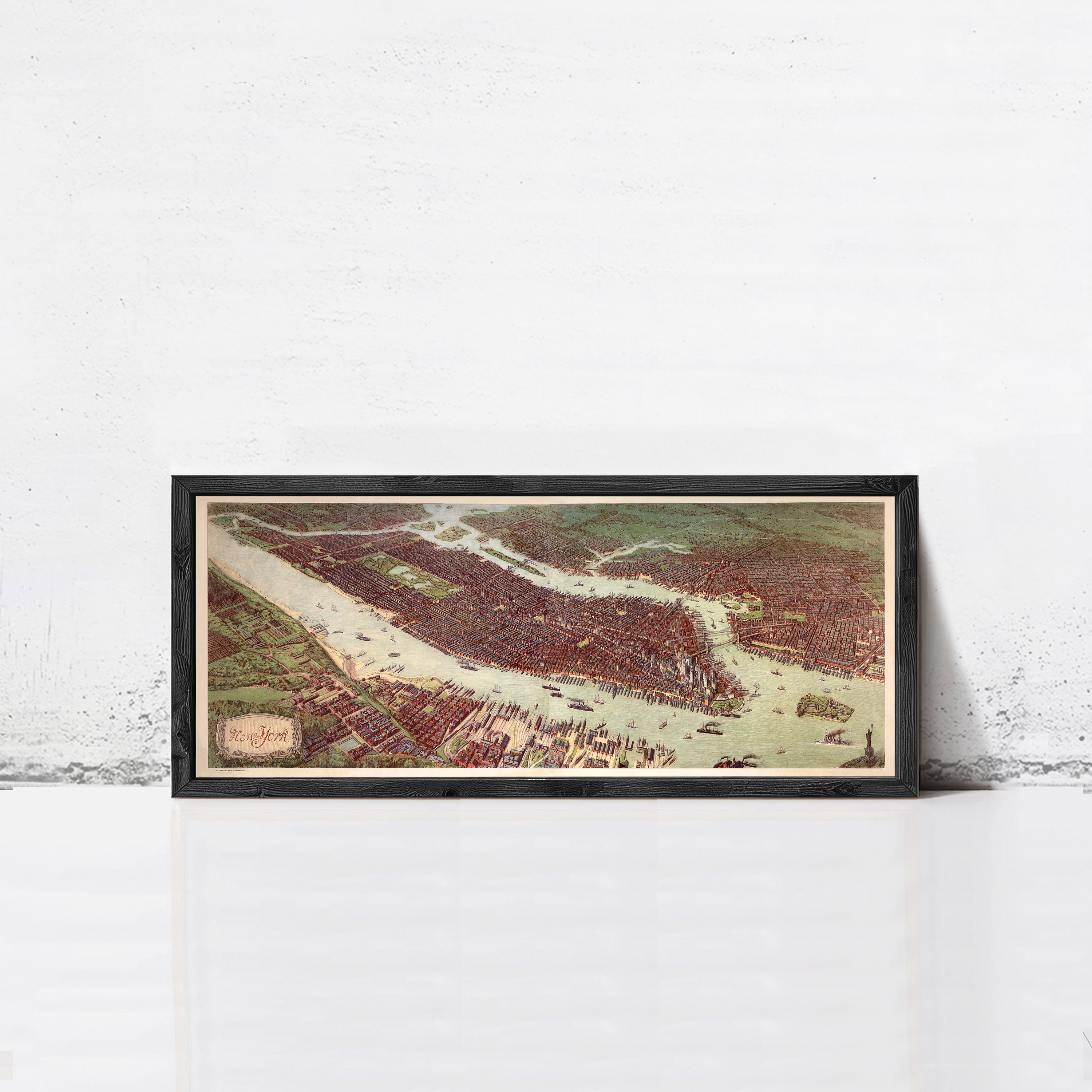 The image is a framed painting or map of a city, depicting a densely populated urban area with various buildings, roads, and waterways.