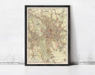The image is a framed vintage map of Leipzig, Germany, depicting the city's layout and surrounding areas.