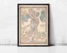 The image is a framed vintage map of Boston, Massachusetts, with a detailed and intricate design.