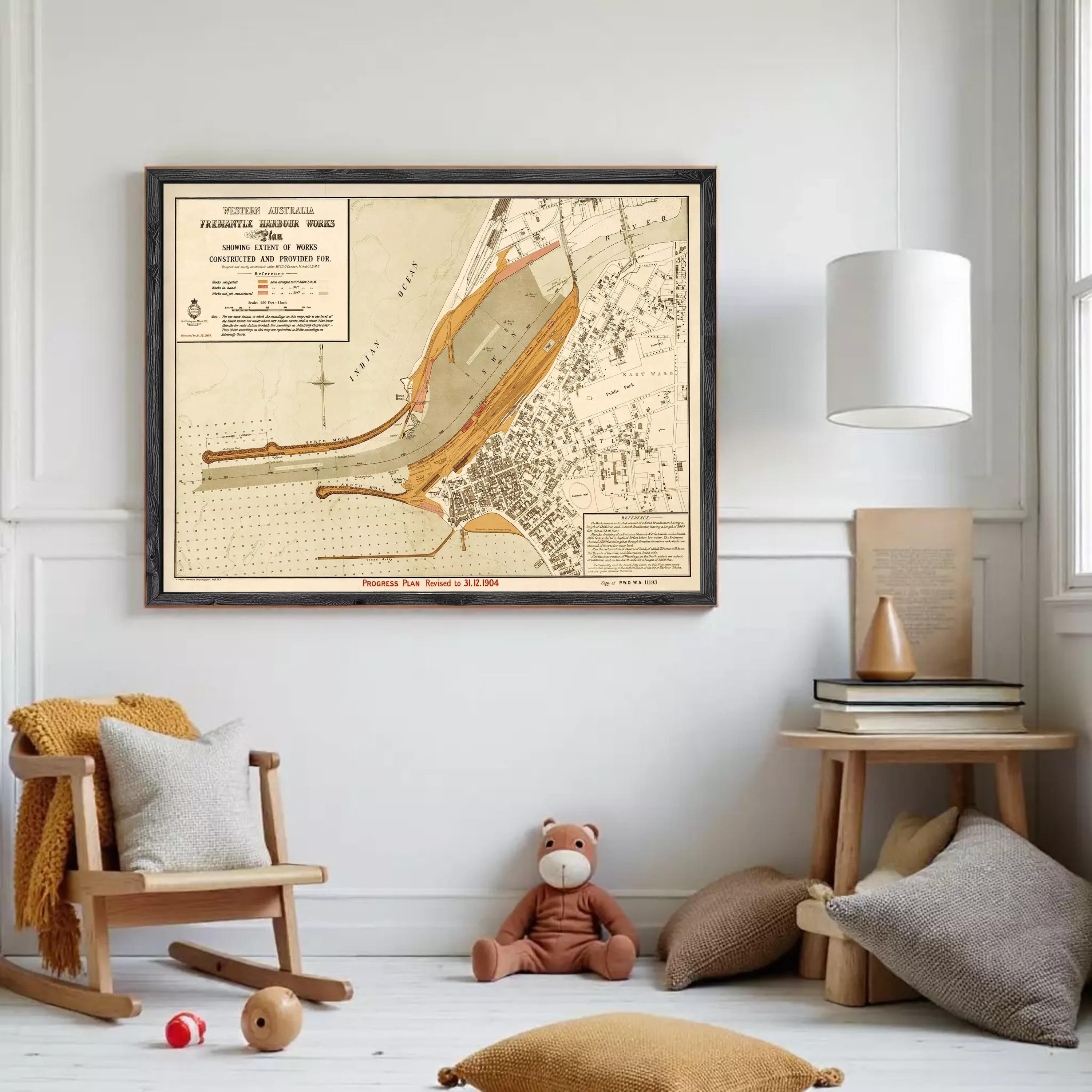 a child's room with a large framed map of Western Australia hanging on the wall. The room has a wooden rocking chair, a teddy bear, and a small table with books and other items.