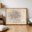 The image is a framed vintage map of Paris, France, depicting the city's layout and surrounding areas.